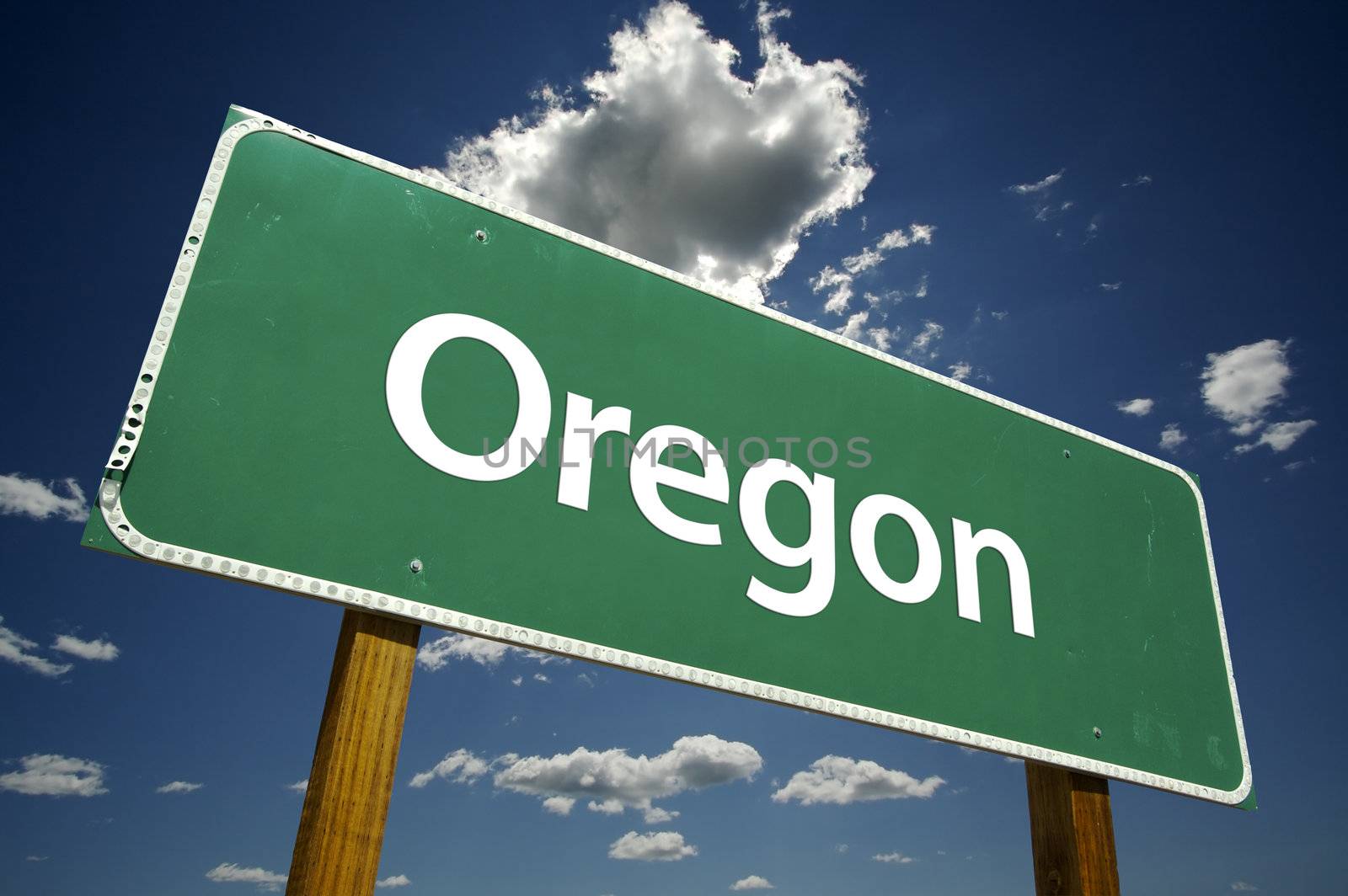 Oregon Road Sign with dramatic clouds and sky.