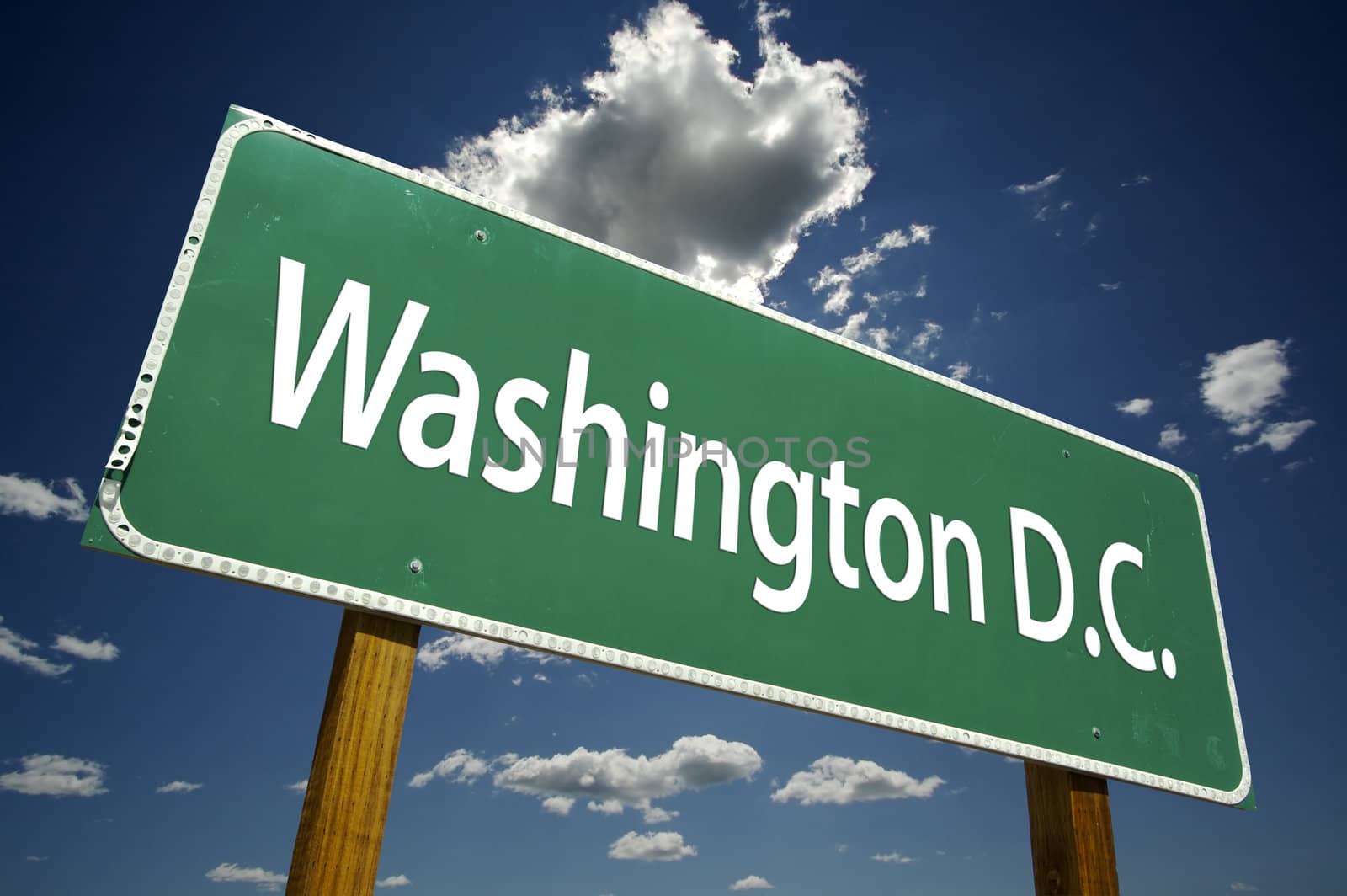 Washington D.C. Road Sign with dramatic clouds and sky.