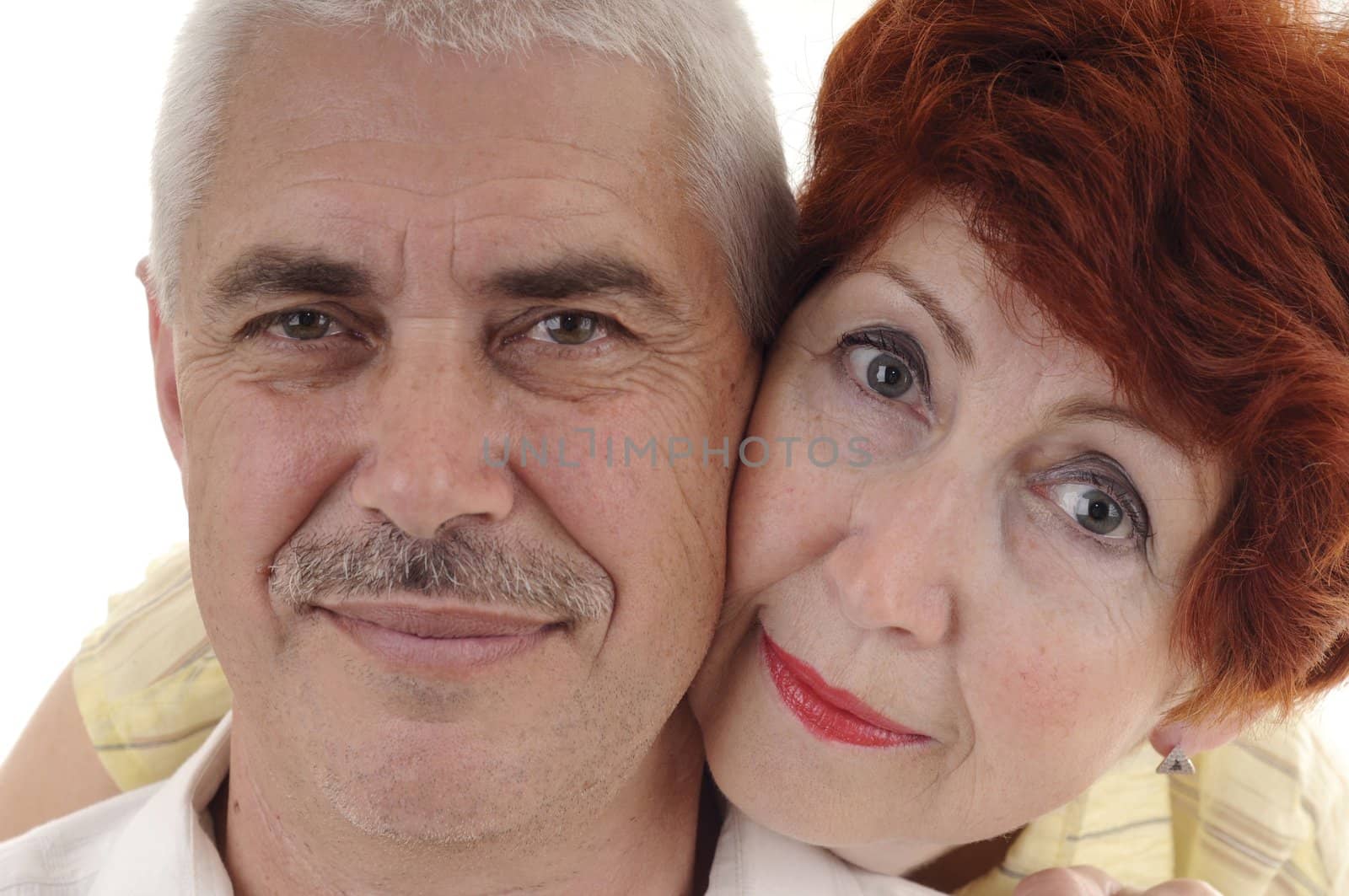 Portrait of seniour couple on white background