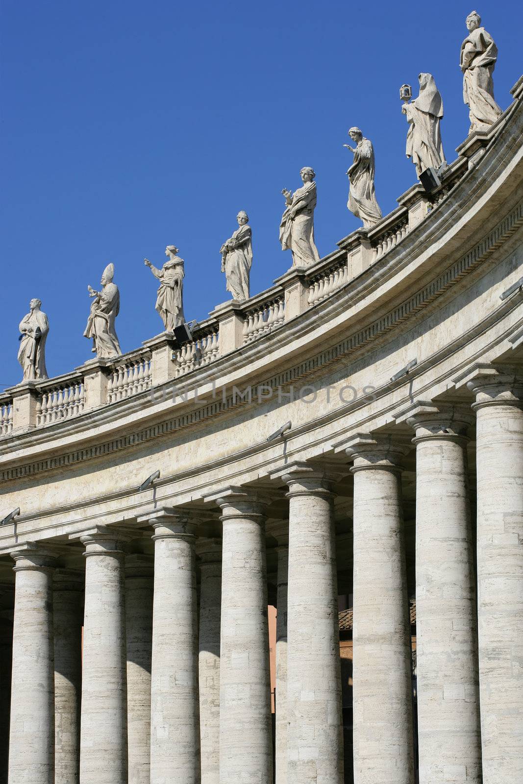 The columns and statues in the square of The Vatican.
