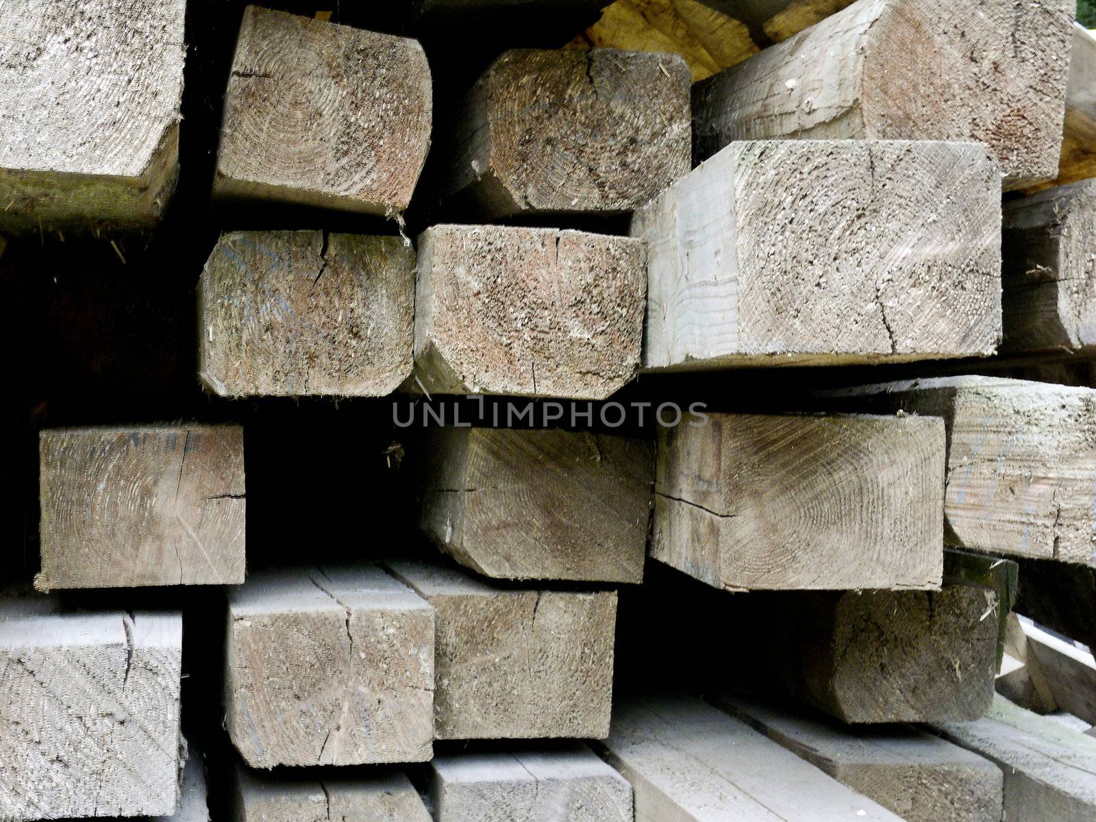 Closeup of a pile of wood with beams  by Farina6000