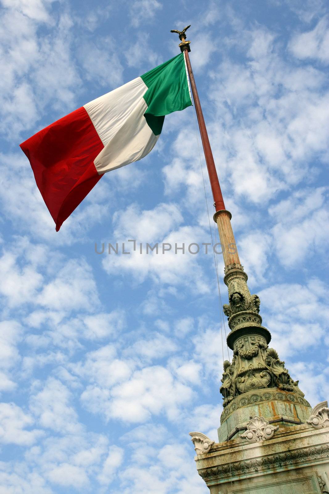The flag of Italy blowing in the wind.
