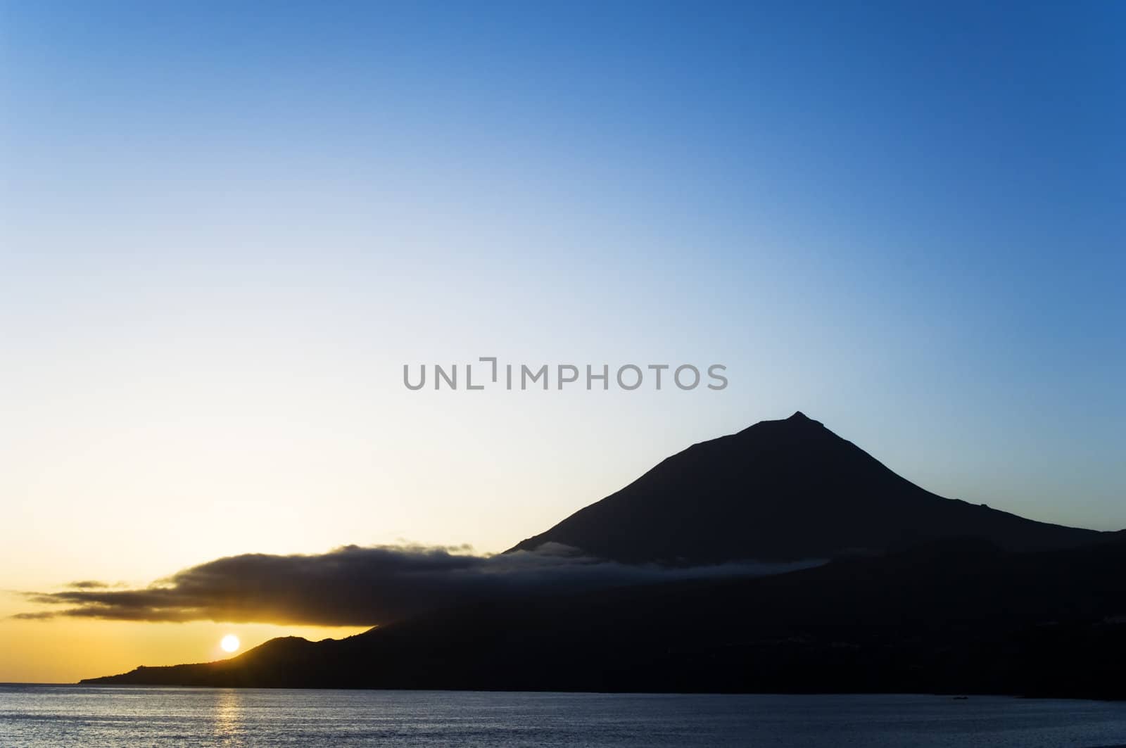 Sunset over the volcano of Pico island, Azores
