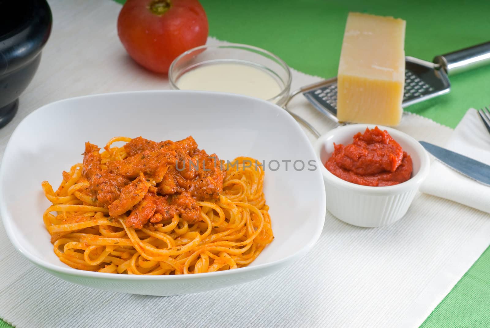 italian spaghetti pasta with fresh homemade tomato and chicken sauce