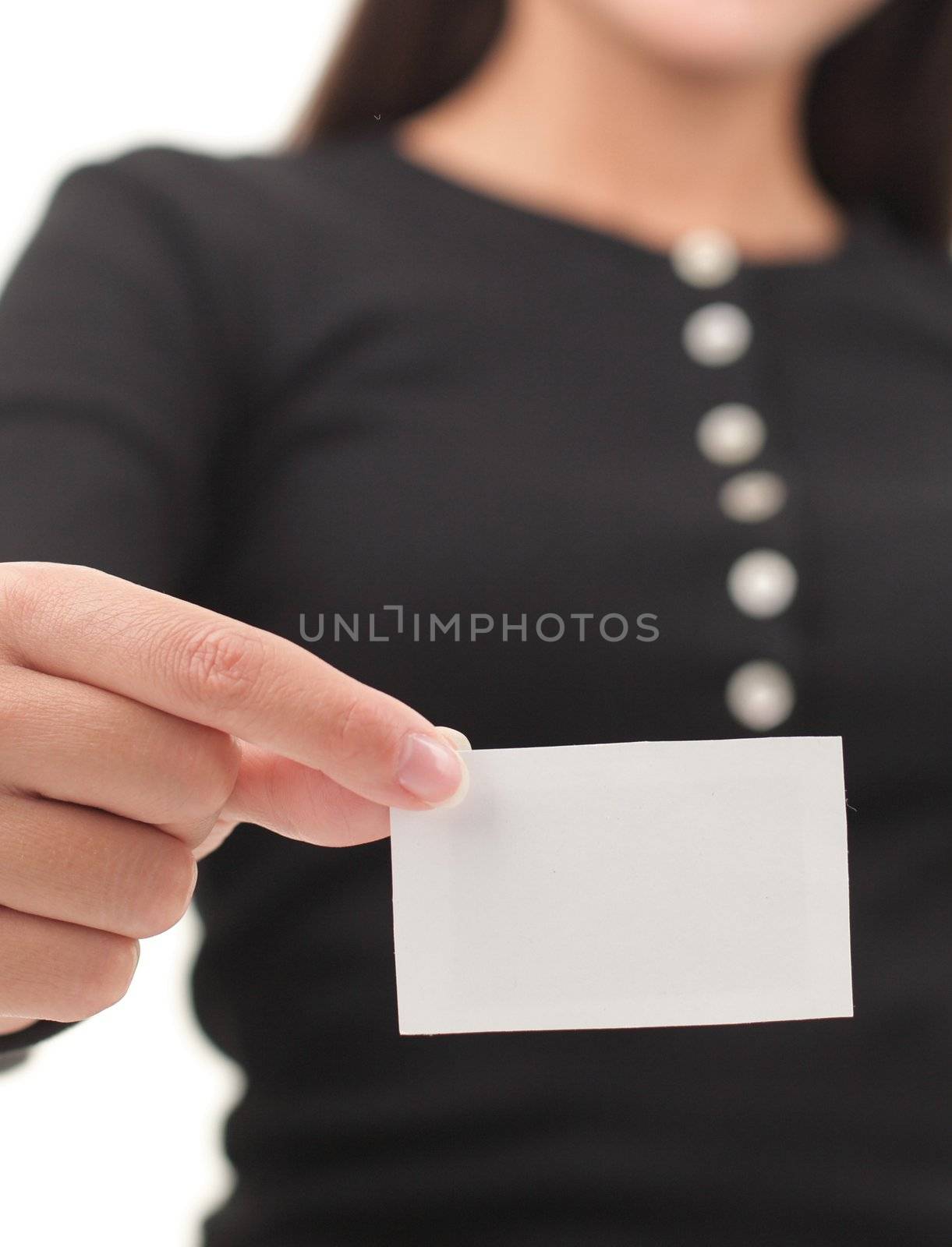 Business card or blank white paper sign. Shallow depth of field, focus on card. 