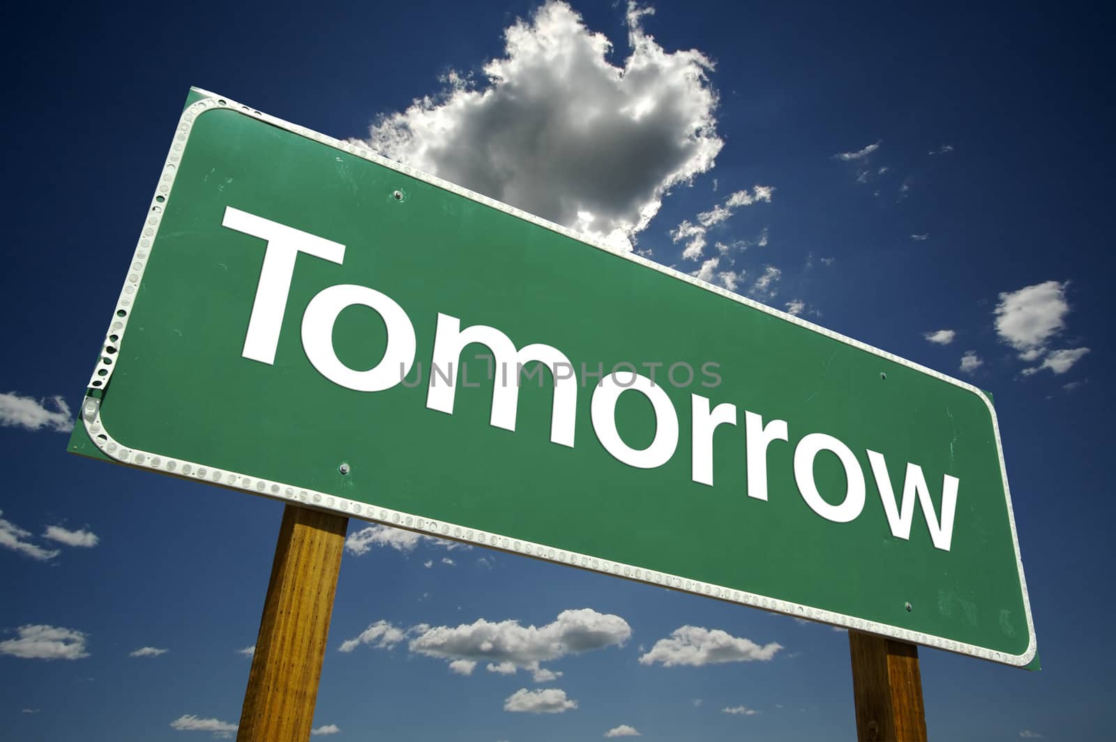 Tomorrow Road Sign with dramatic clouds and sky.