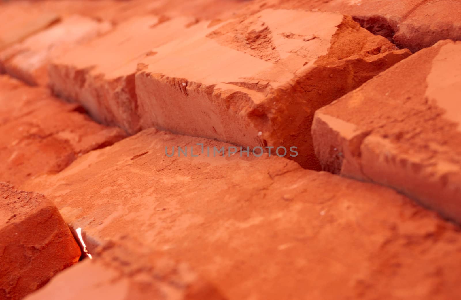 close-up of baked bricks with red surface