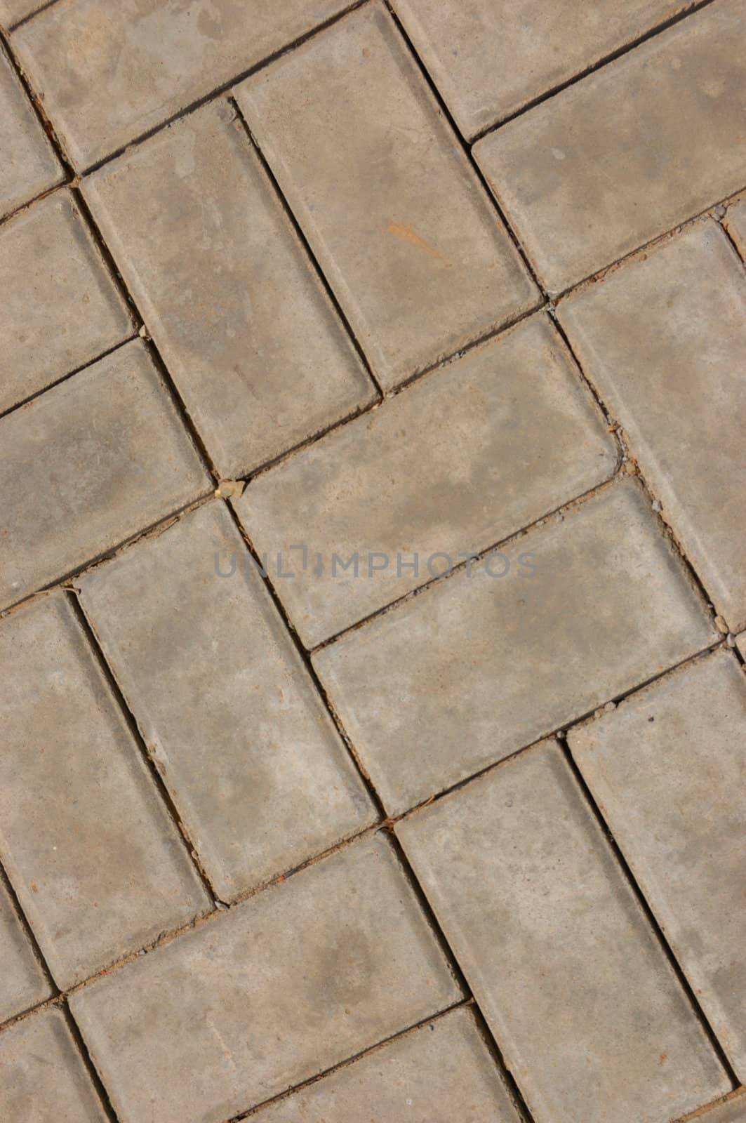 new pavement of stoneblocks (bricks) of grey color