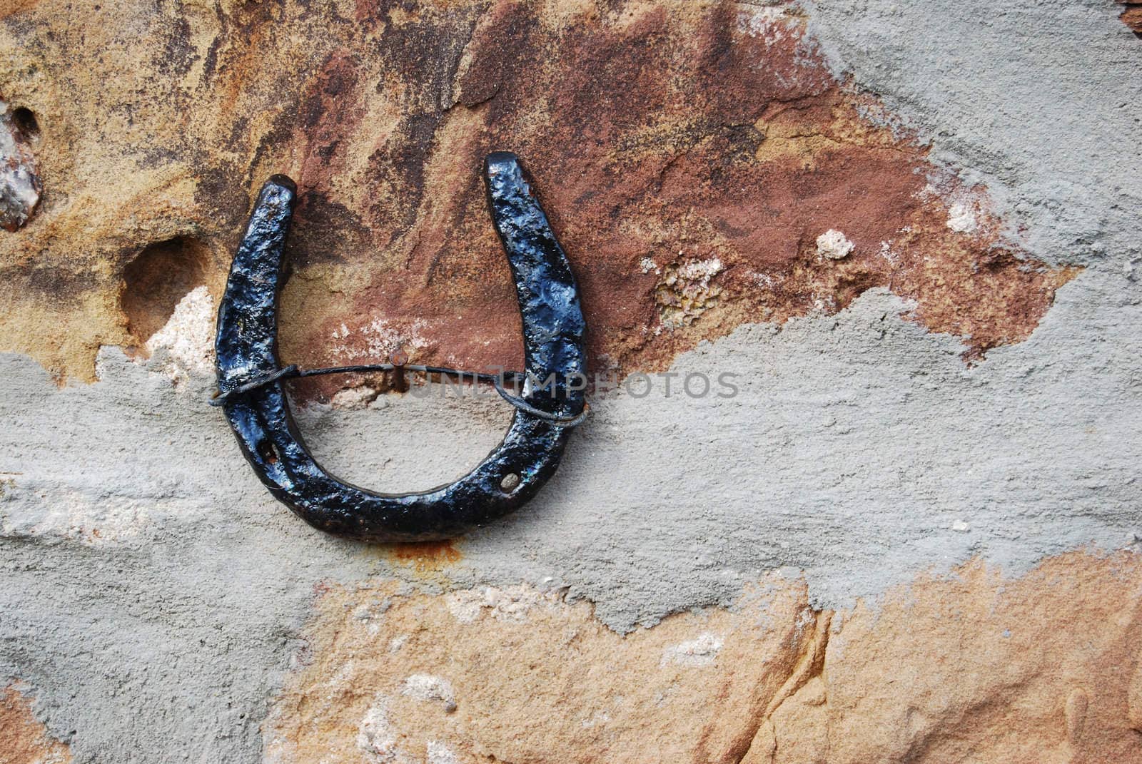 Horseshoe hanging on a wall bringing luck