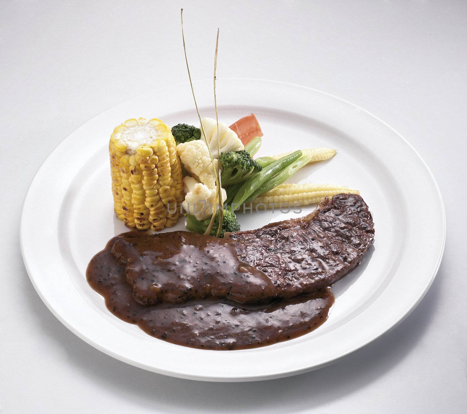 black pepper steak with corn