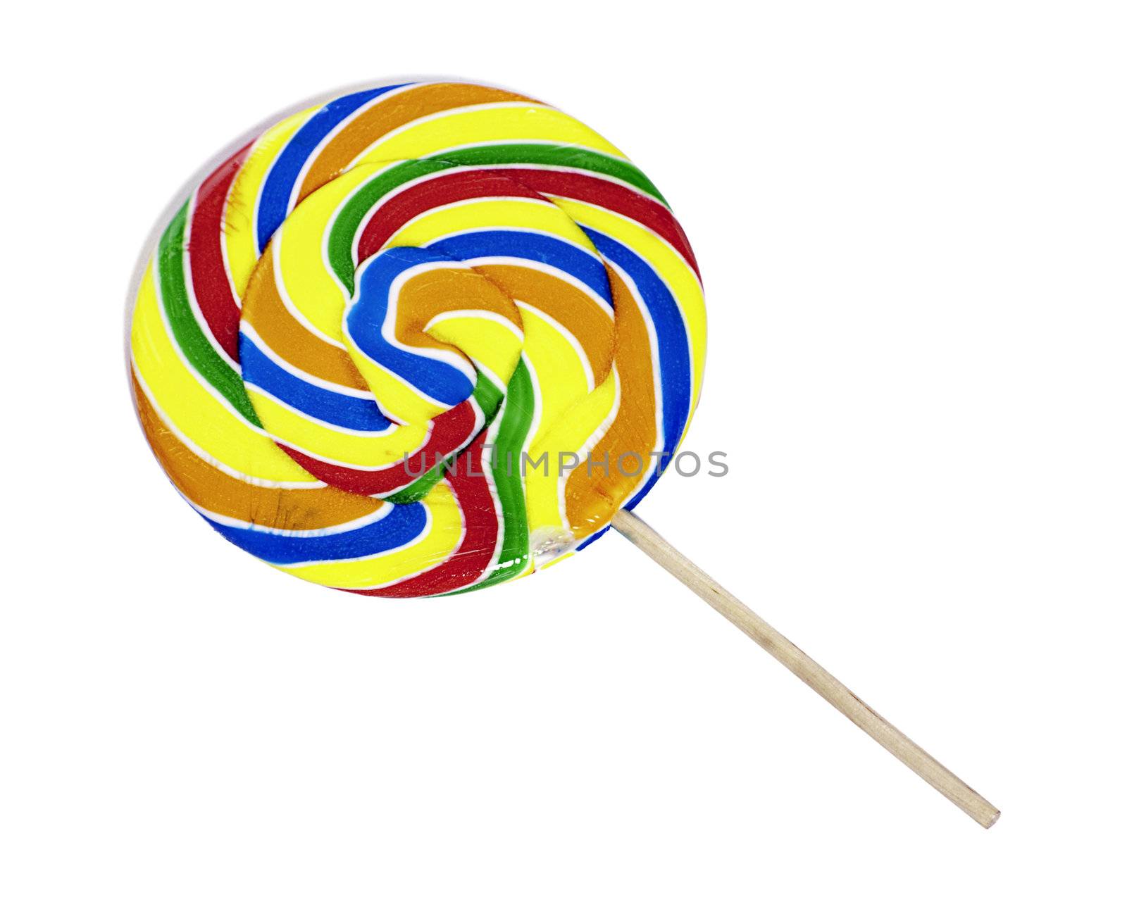 A large multicolored carnival lollipop is isolated against a white background
