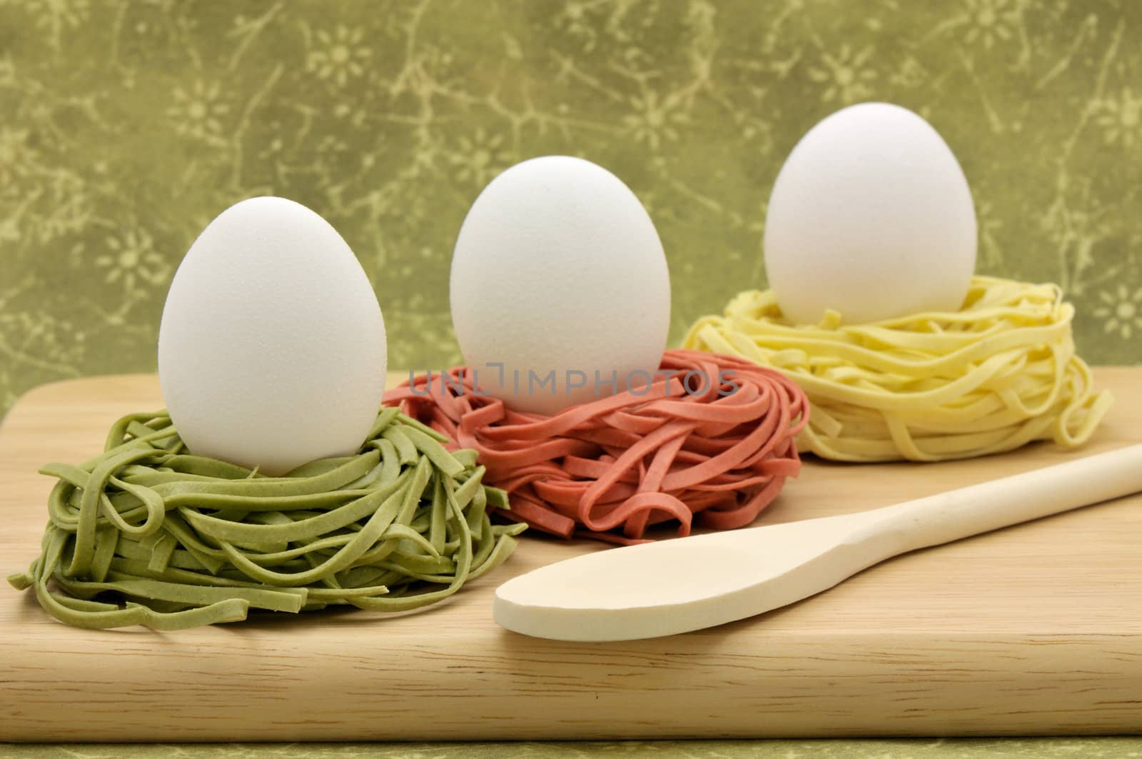 Fresh Italian pasta nests with eggs ready to cook