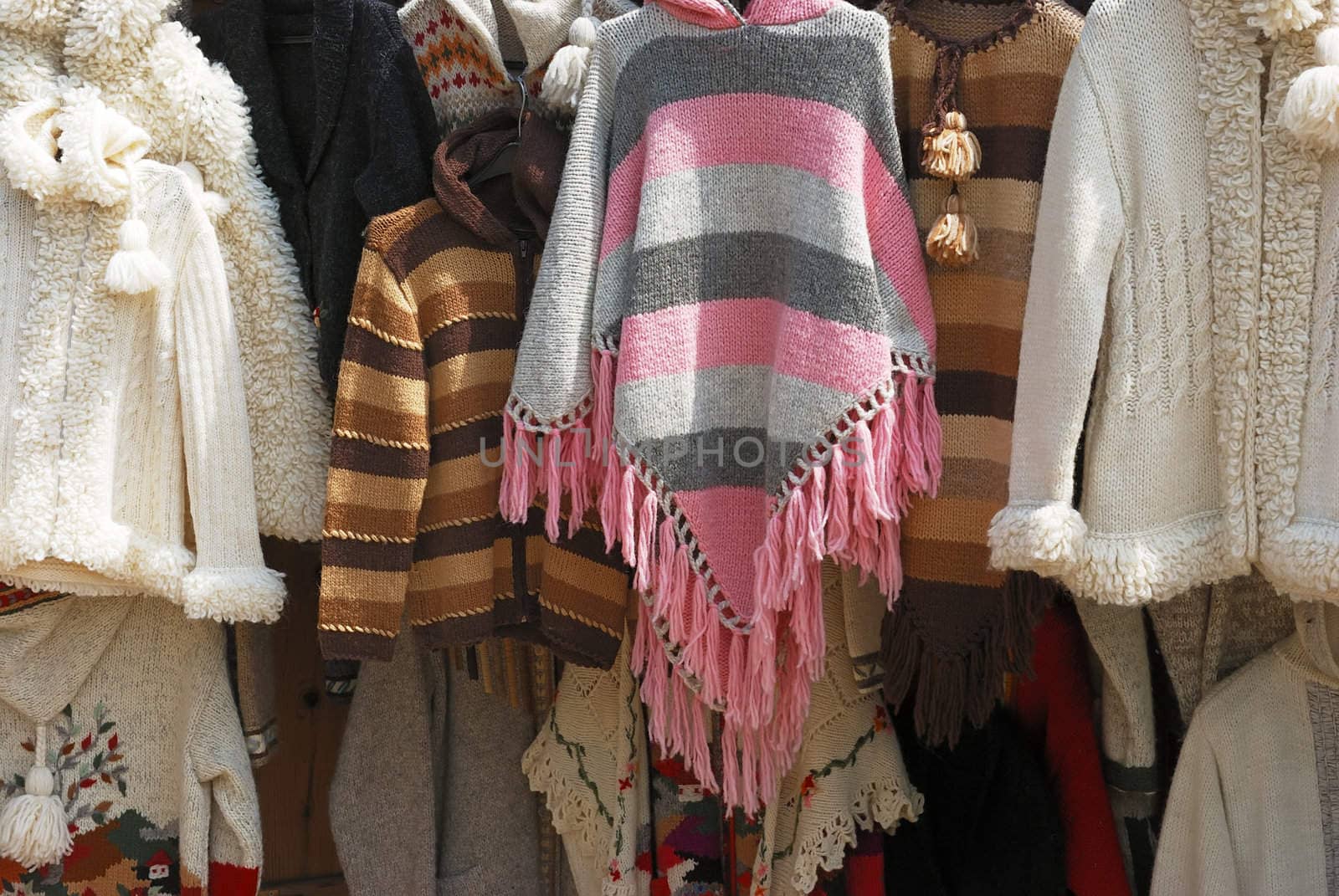 Colorful woolen handmade sweaters on sale.