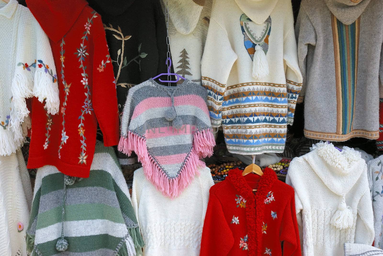 Colorful woolen handmade sweaters on sale.