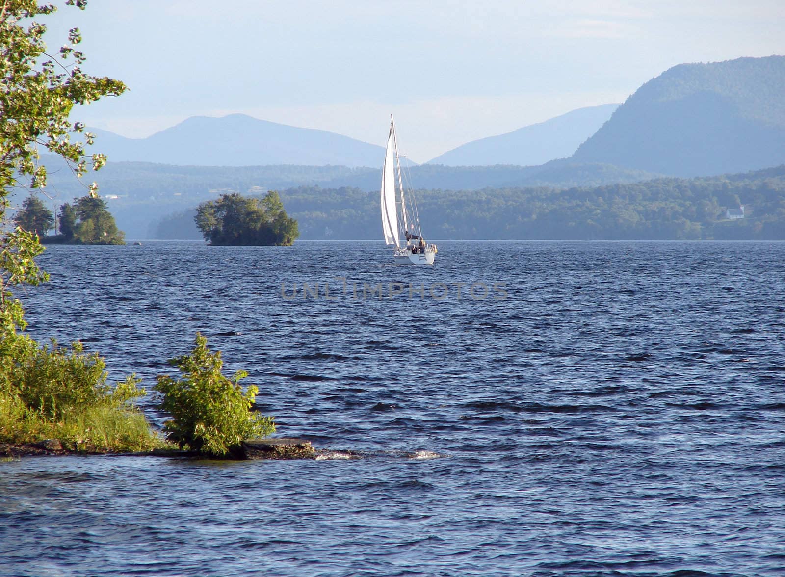 Sailboat on Memphremagog lake in Magog, Province of Quebec, Canada