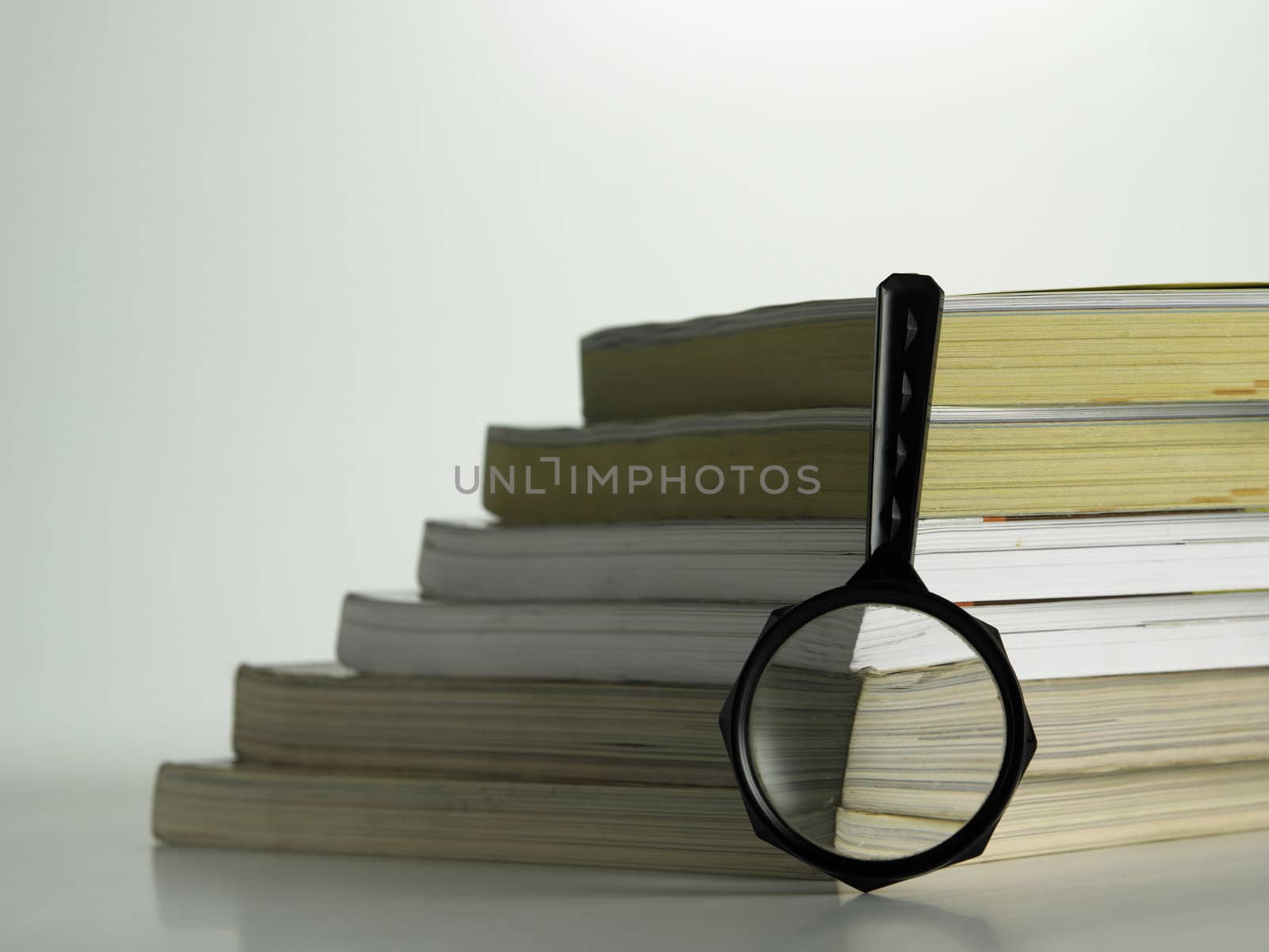 magnifier and book by eskaylim