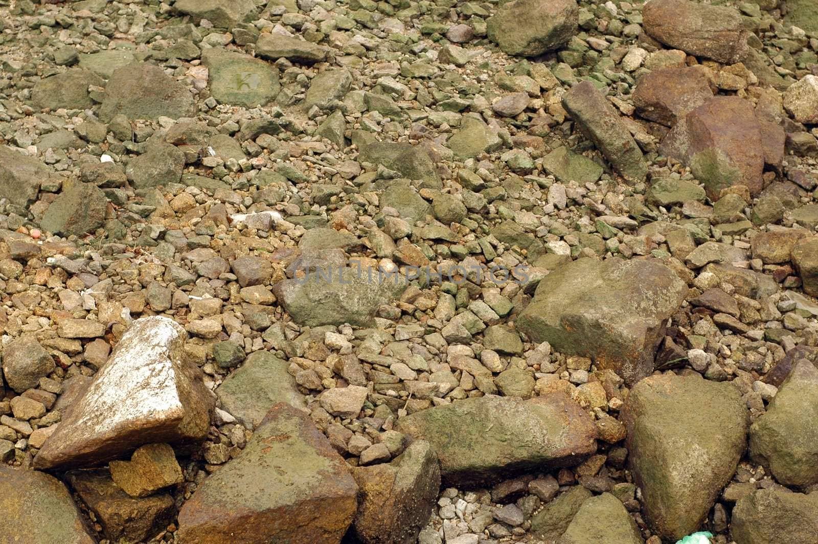 Rocks by the pier. Great for texture backdrop