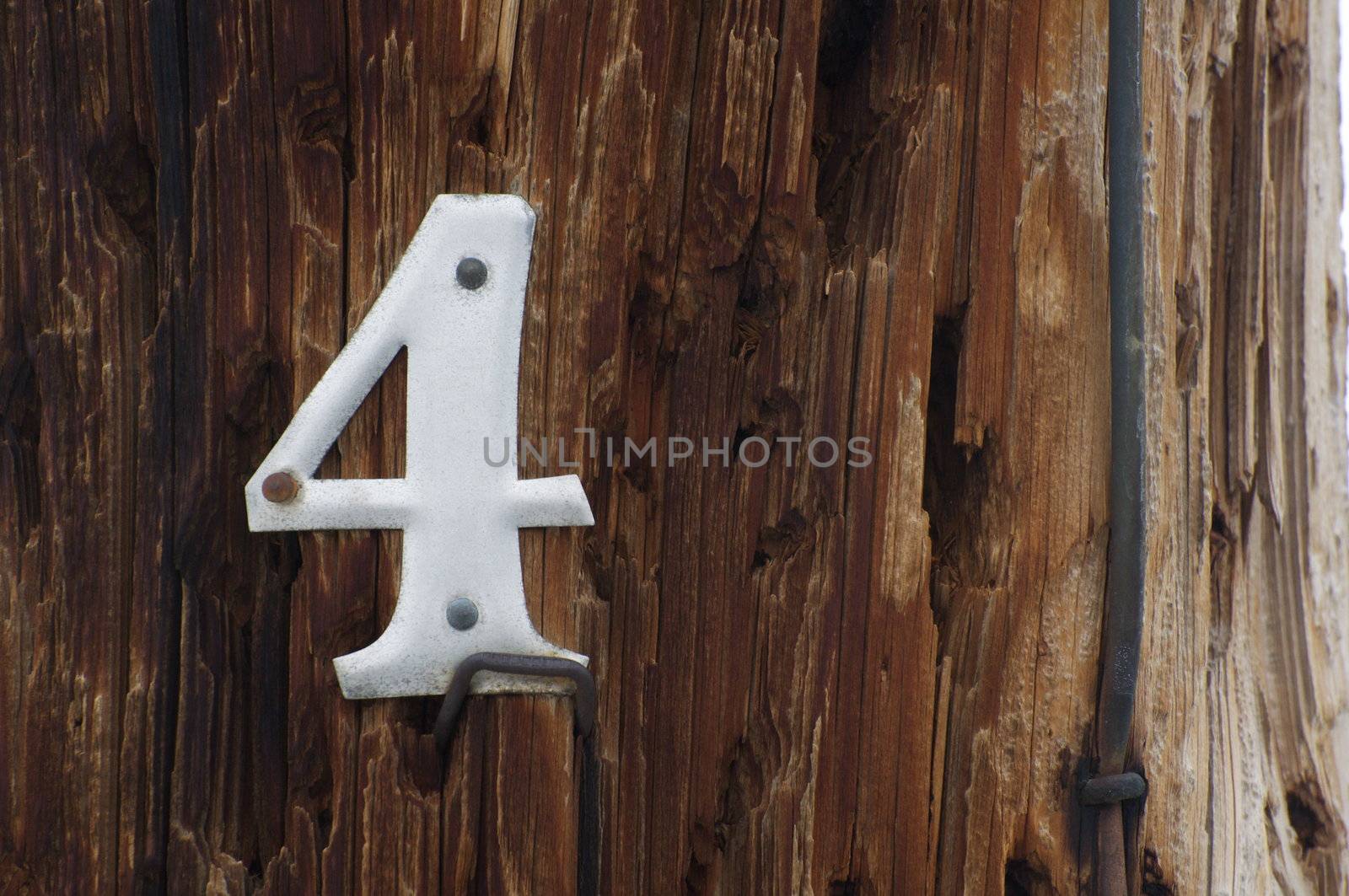 Wood Background with Metal Four by gilmourbto2001