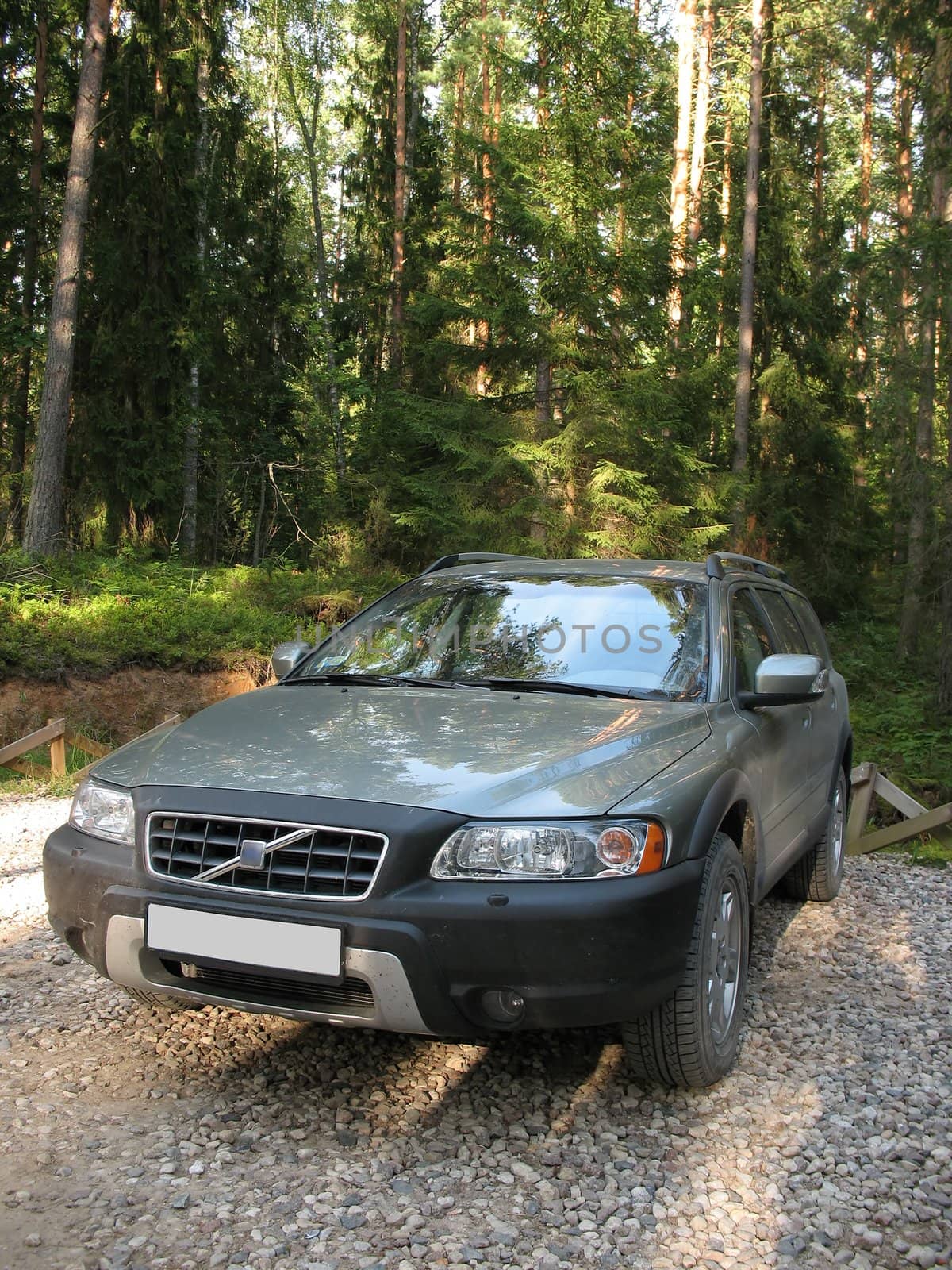 4x4 European wagon parked on a forest. by julien