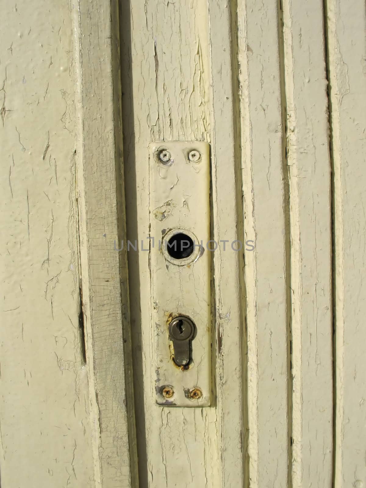 A wooden door without handle.