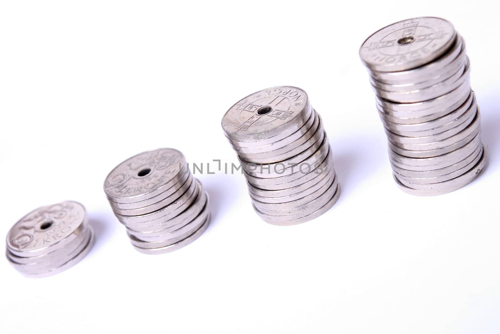 Stacks of coins by litleskare