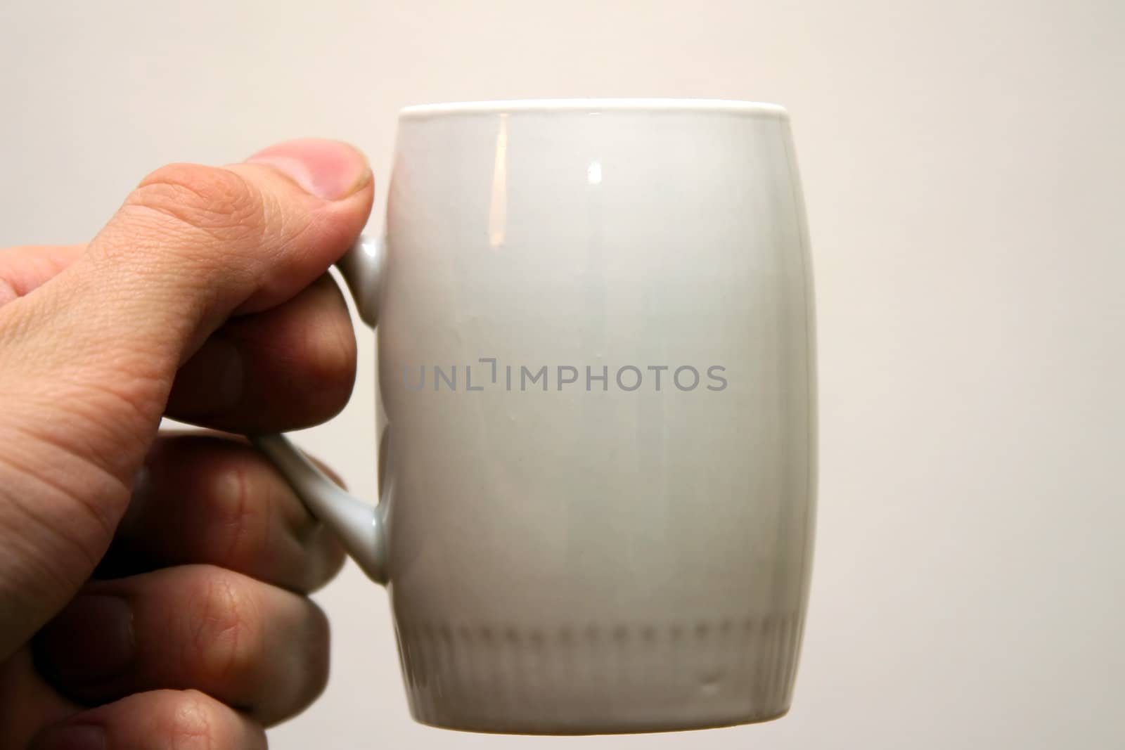 Hand with cofee cup. by julien