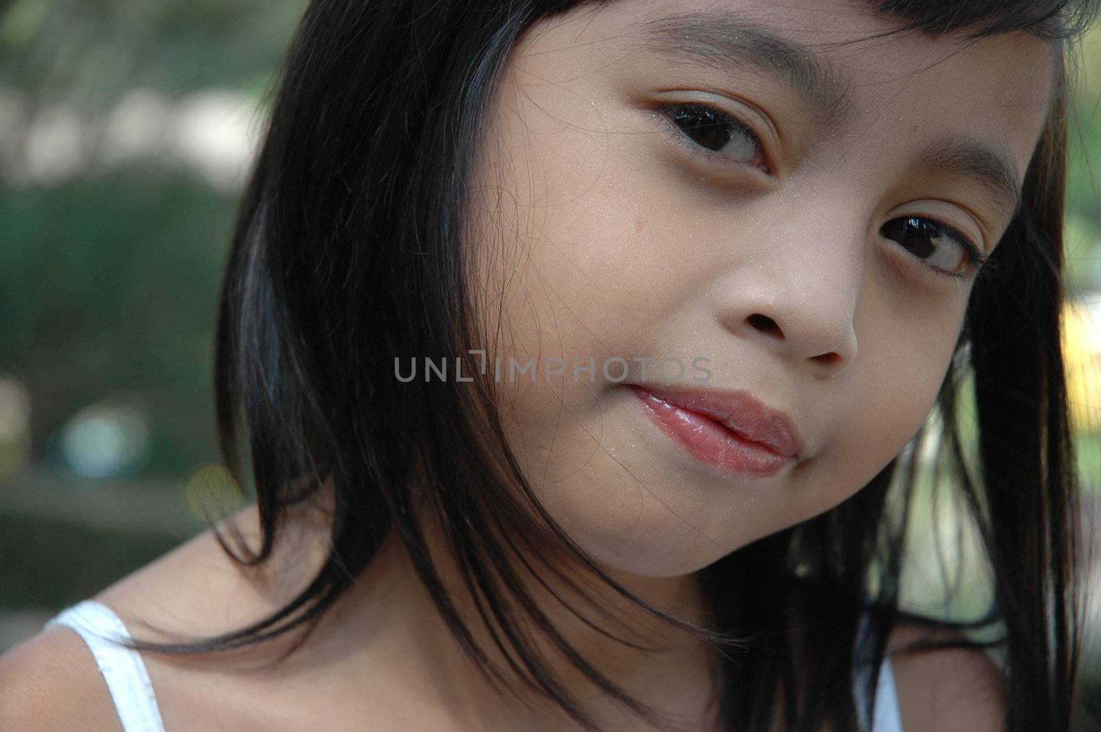 little asian girl with nice smile expression