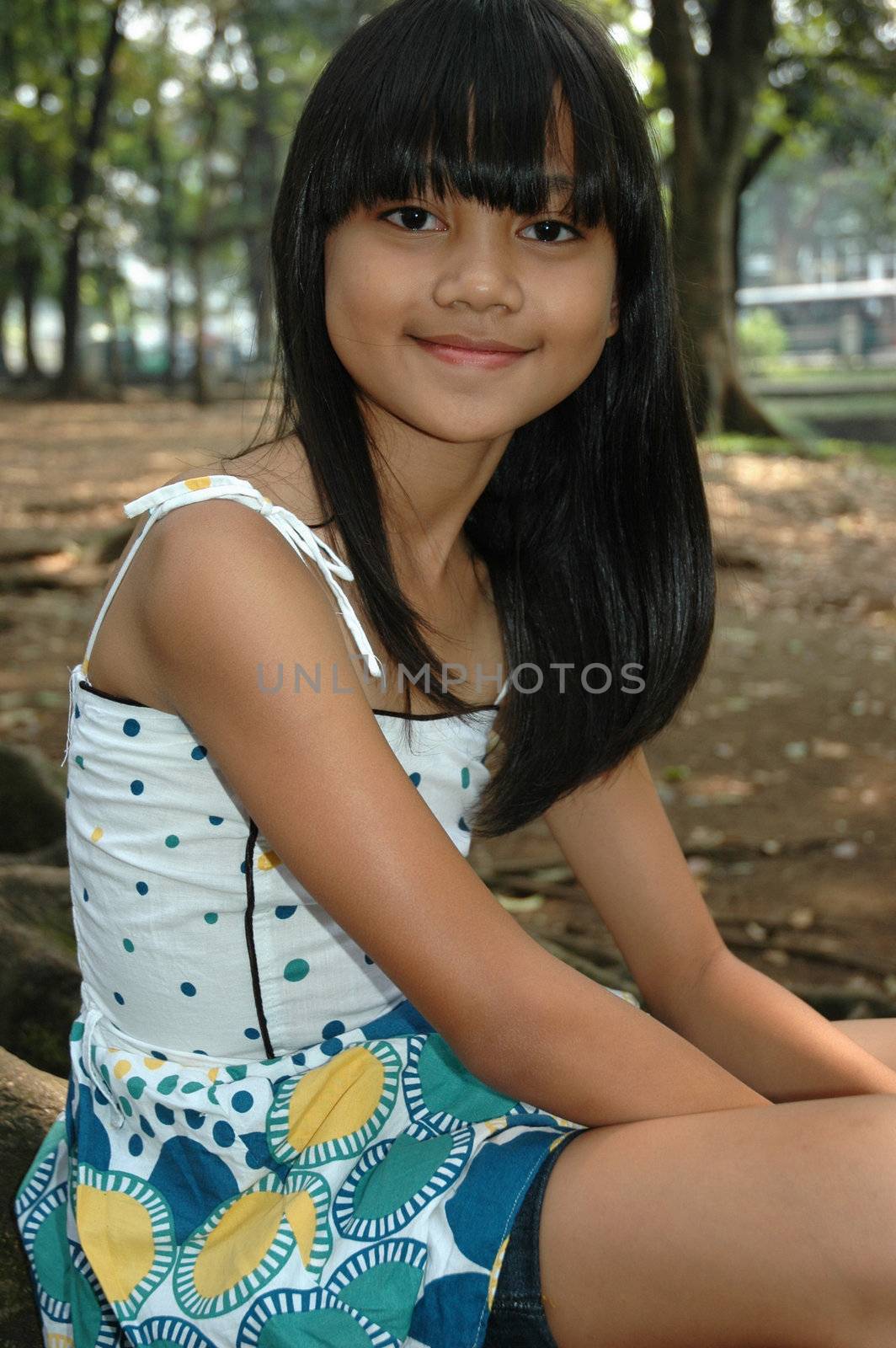 little asian girl with nice smile expression