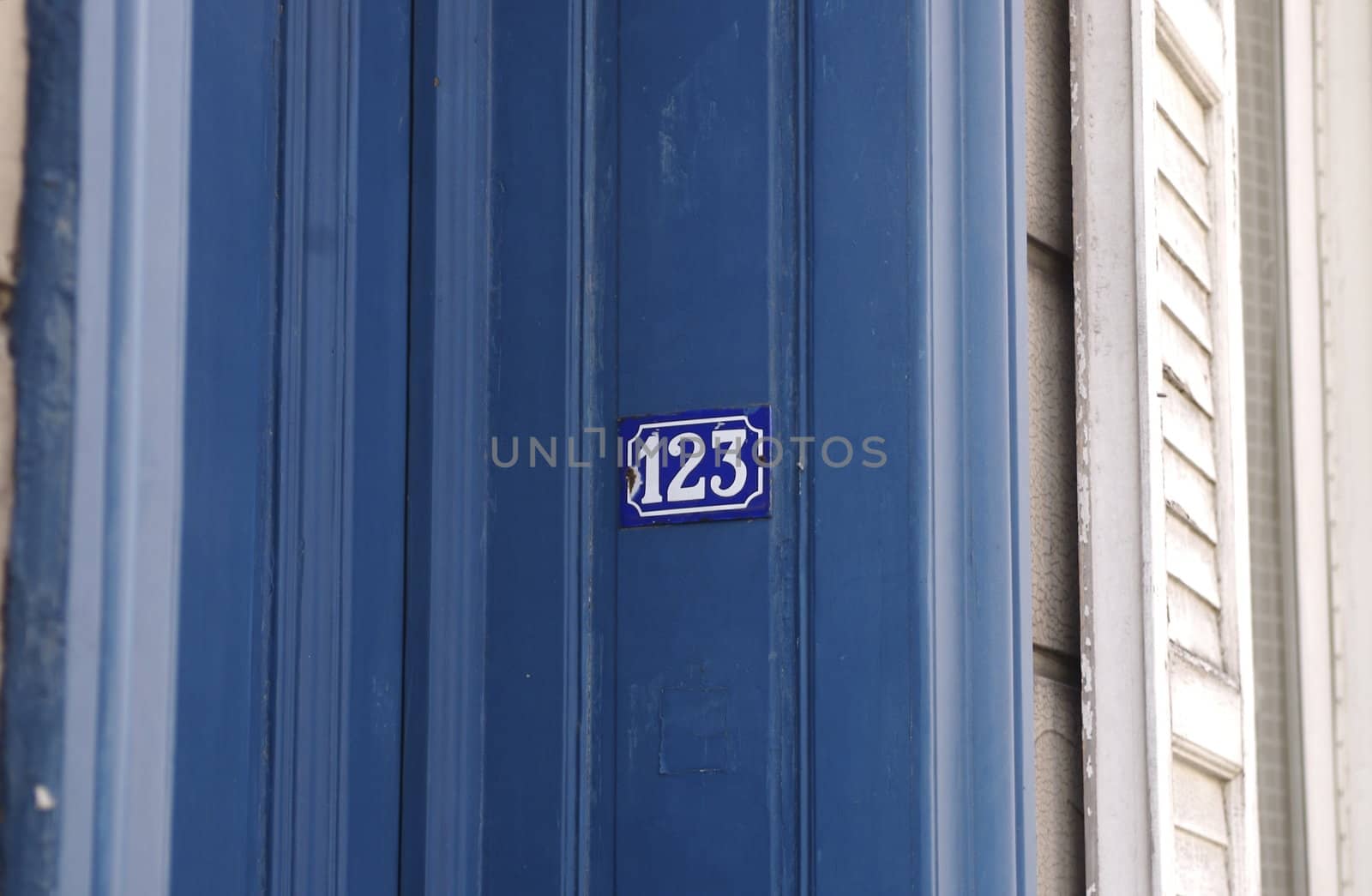 Blue doorway of a house '123'