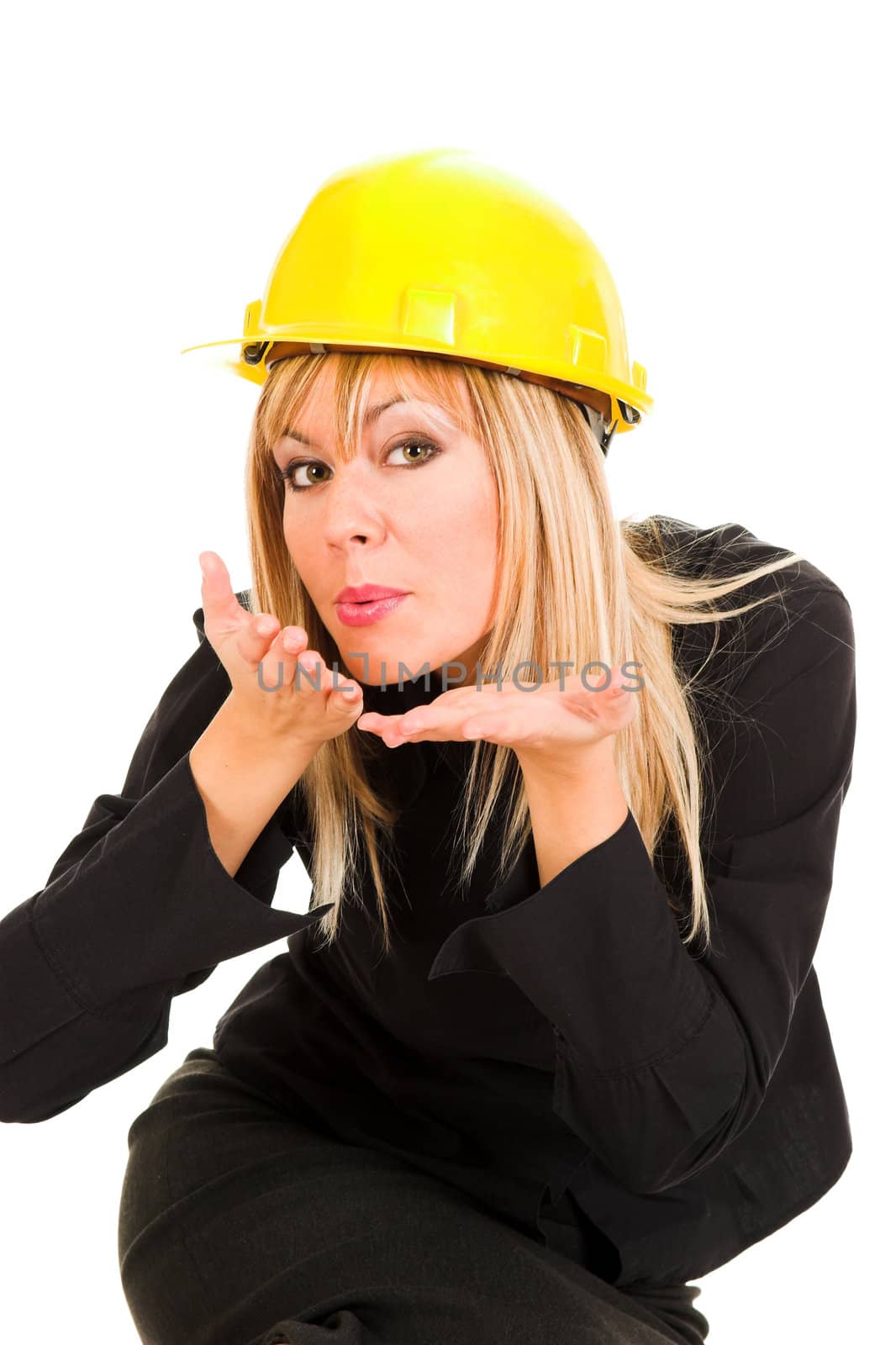 A businesswoman sending a kiss on white background 