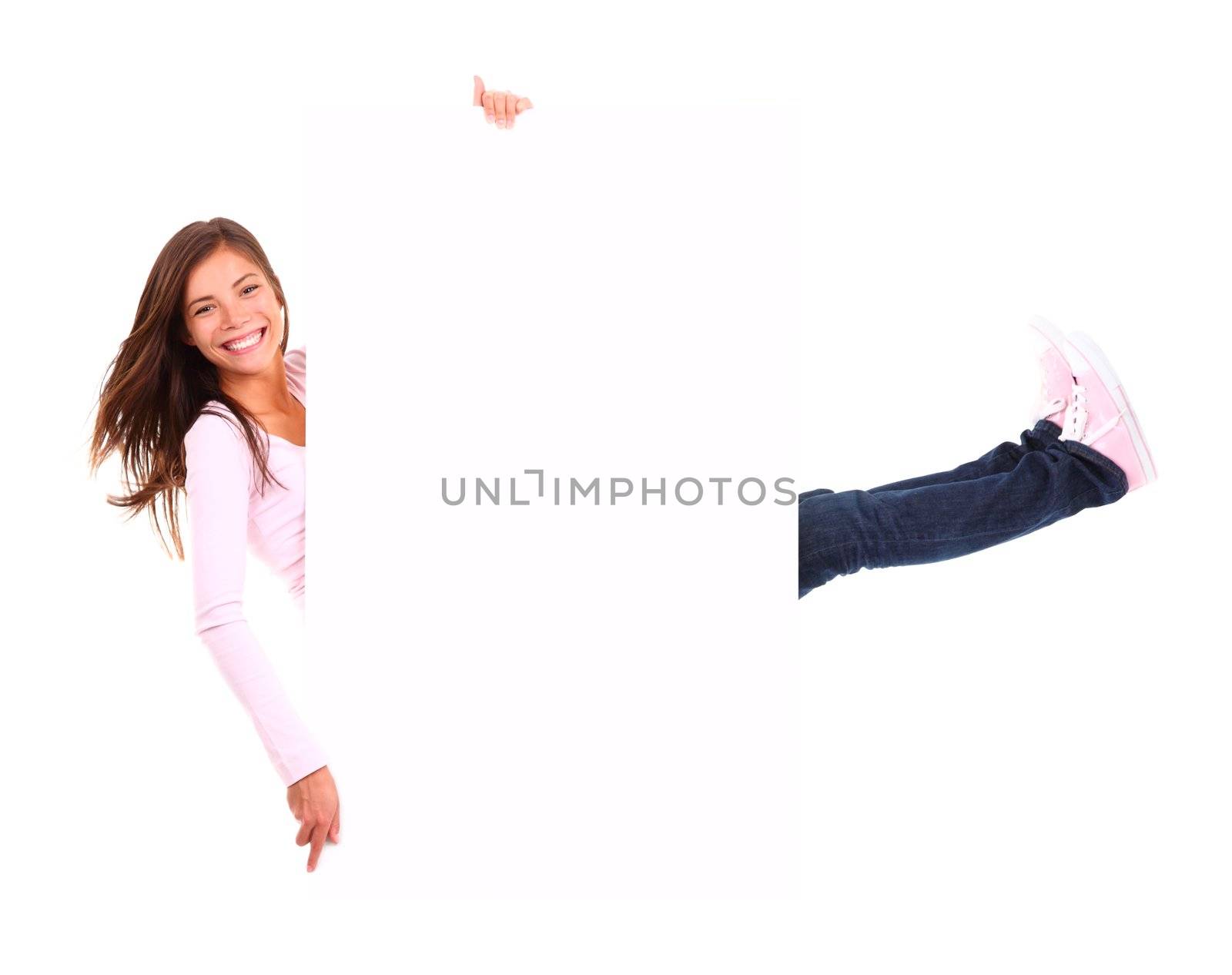 Funny sign / billboard. Funny full length image of woman holding a white blank board / placard. Beautiful mixed race asian / caucasian model. Isolated on white background.