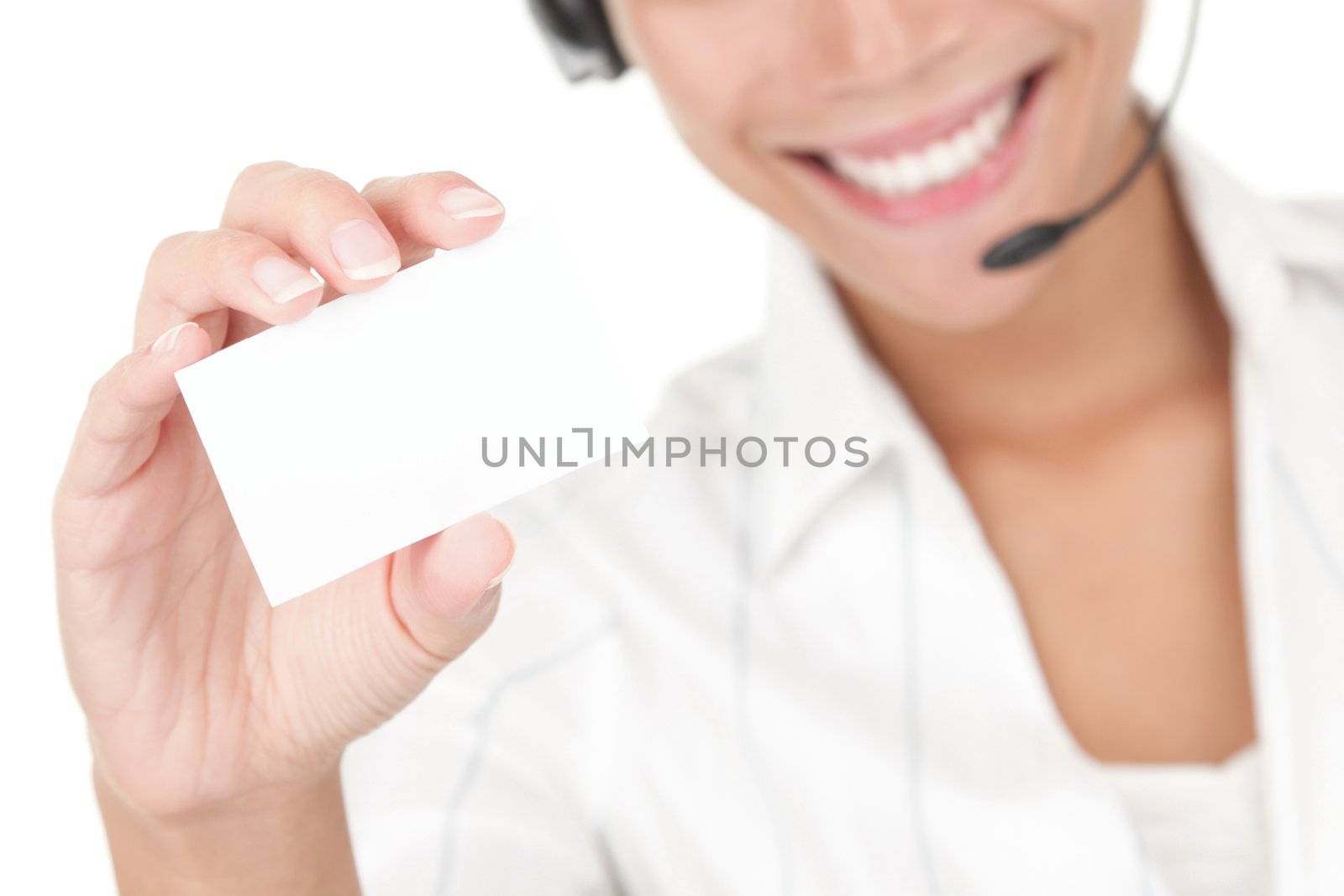 Businesswoman with headset holding business card by Maridav