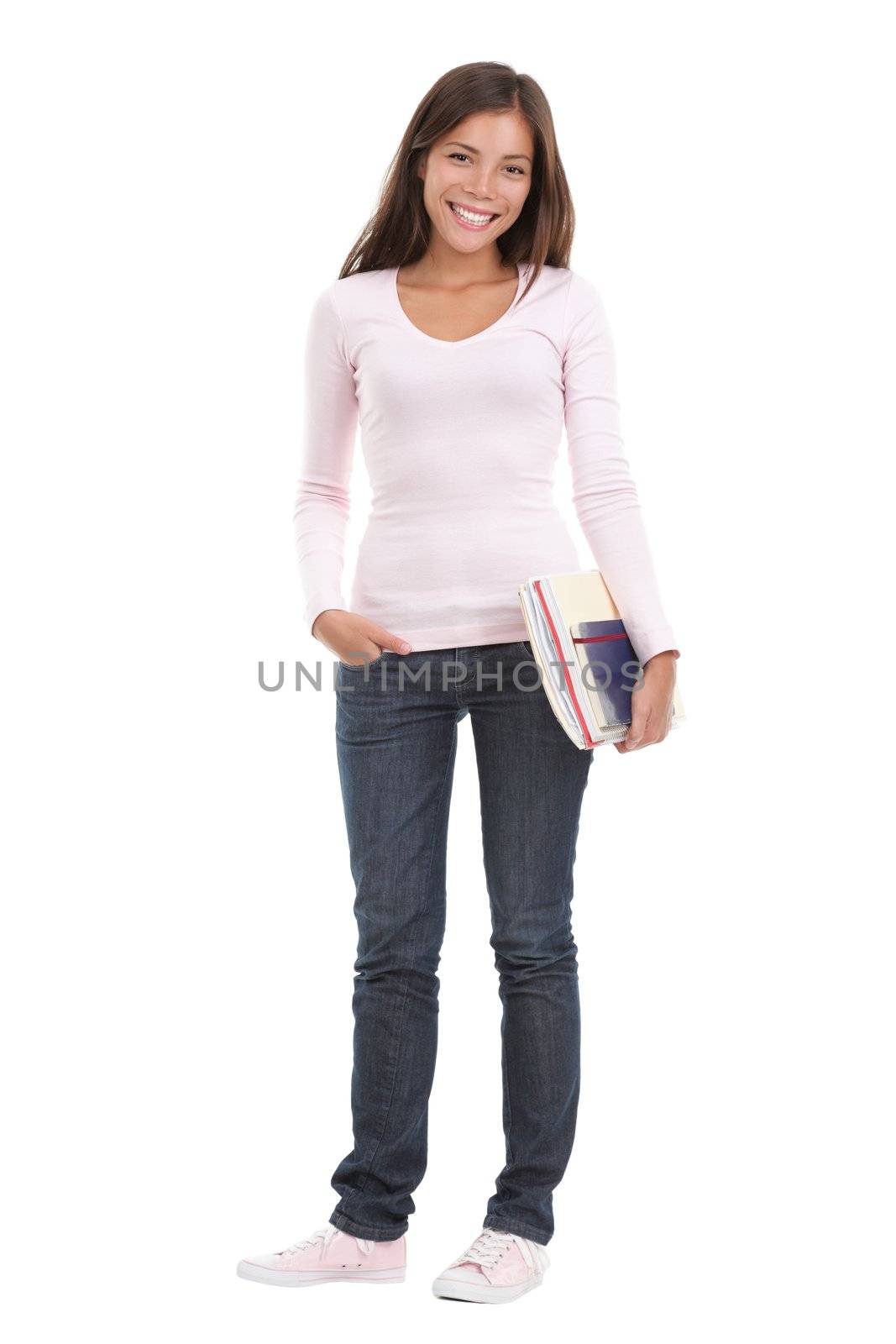 Woman university / college student. Full length image of female student holding books. Beautiful mixed race chinese / caucasian model. Isolated on seamless white background.