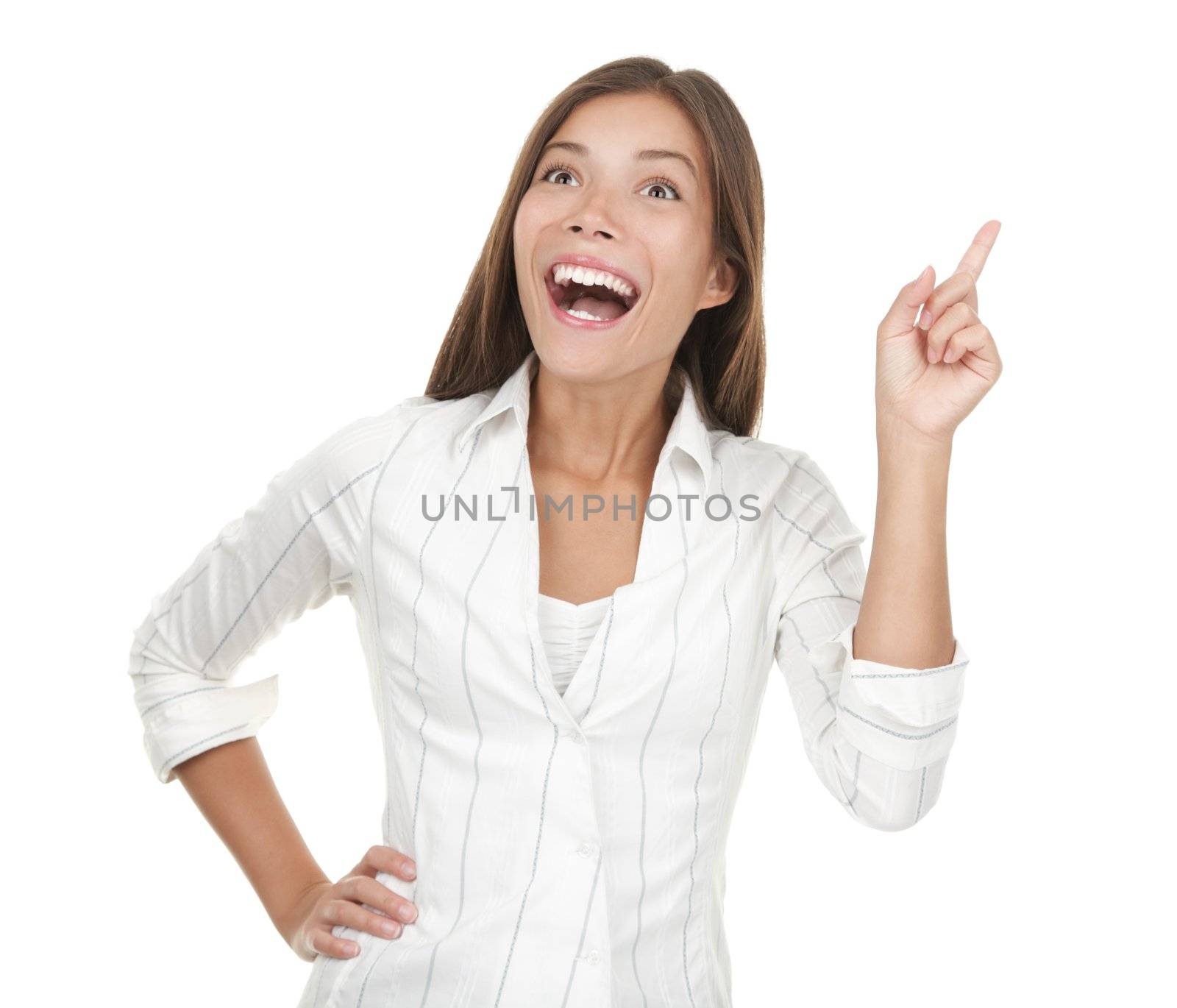 Woman having an idea - eureka! Casual beautiful young mixed race chinese / caucasian businesswoman isolated on seamless white background. 