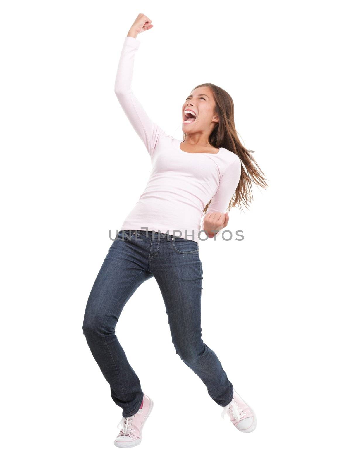 Winning success woman in full length cheering and screaming of joy. Casual young mixed race chinese / caucasian isolated in full body on white background.