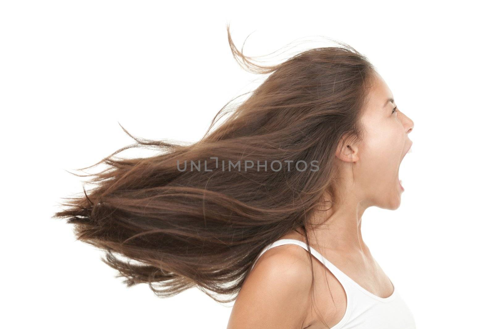Screaming woman. Angry and upset beautiful young mixed race chinese / caucasian woman in profile. Isolated on white background