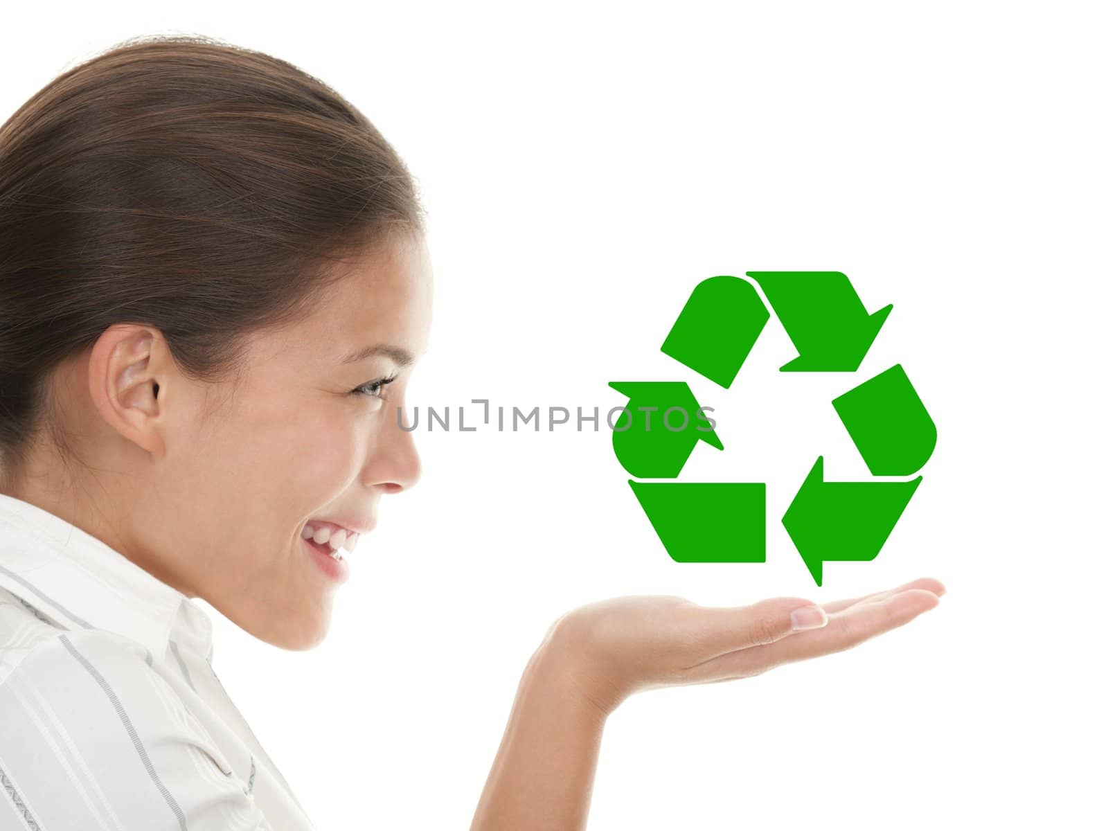 Recycling woman holding the international icon / symbol for recycling.  Beautiful young mixed race chinese / caucasian woman in profile. Isolated on white background