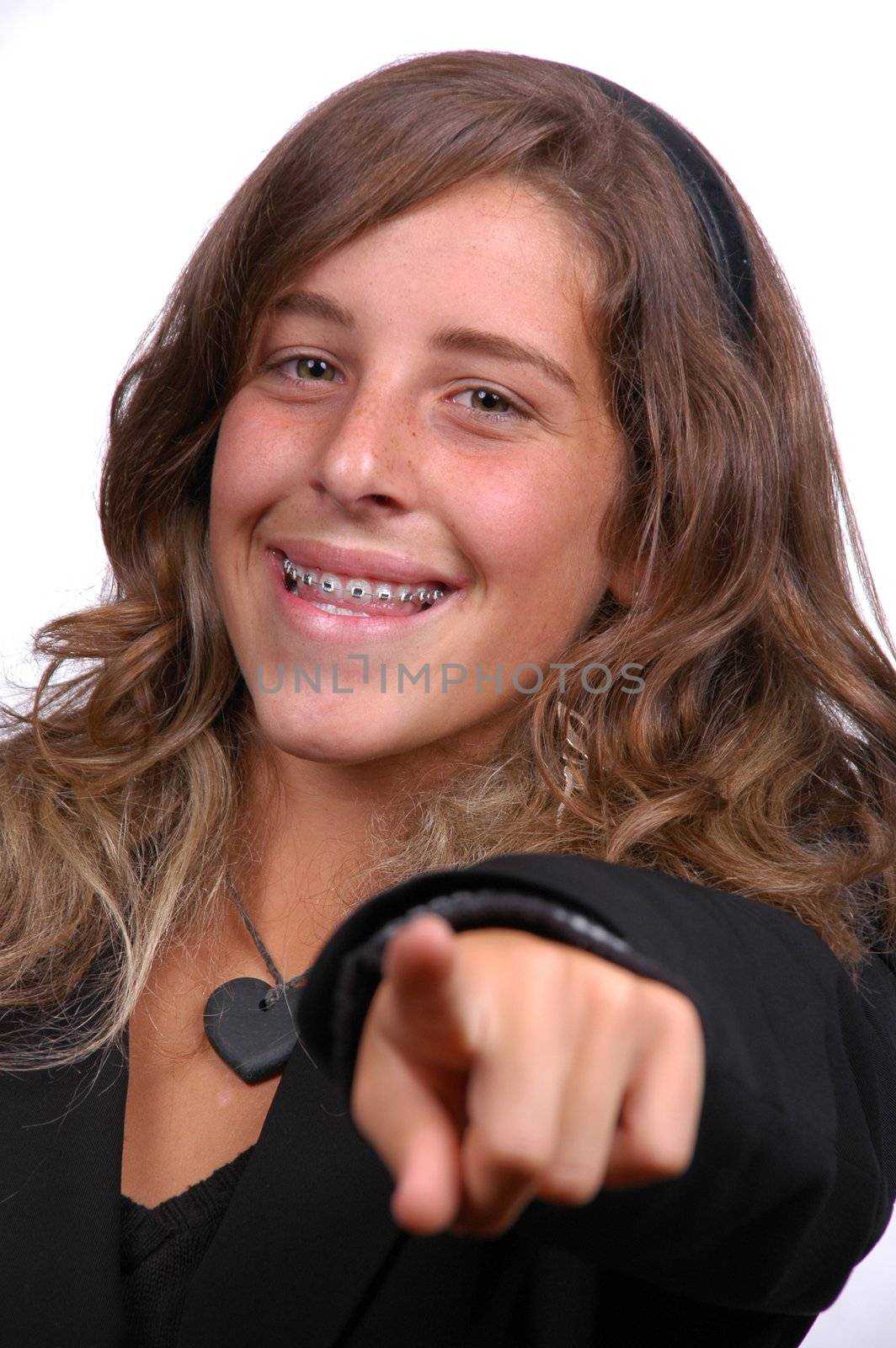 blonde teenager pointing a finger