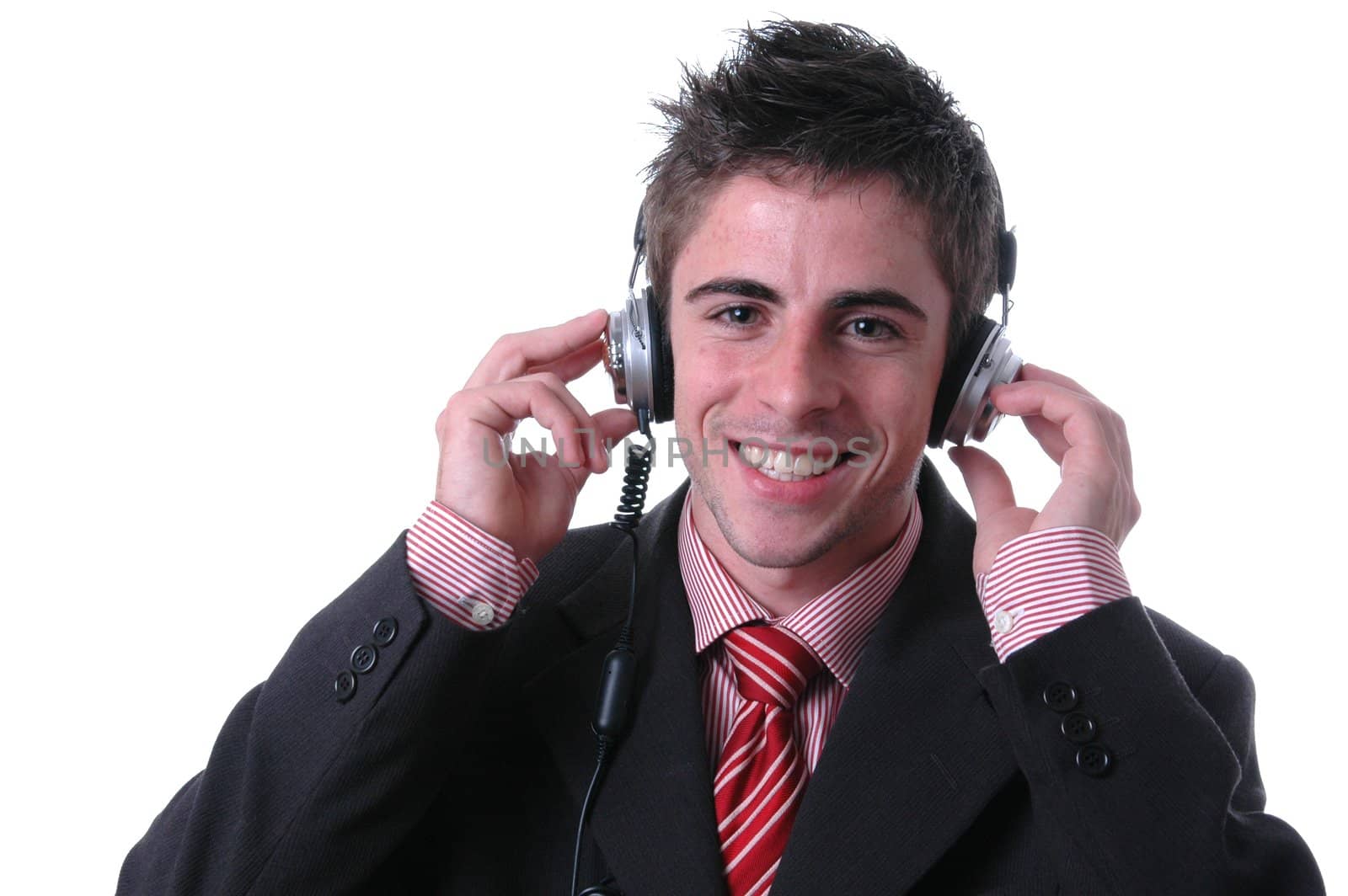 young businessman listen music on white by raalves