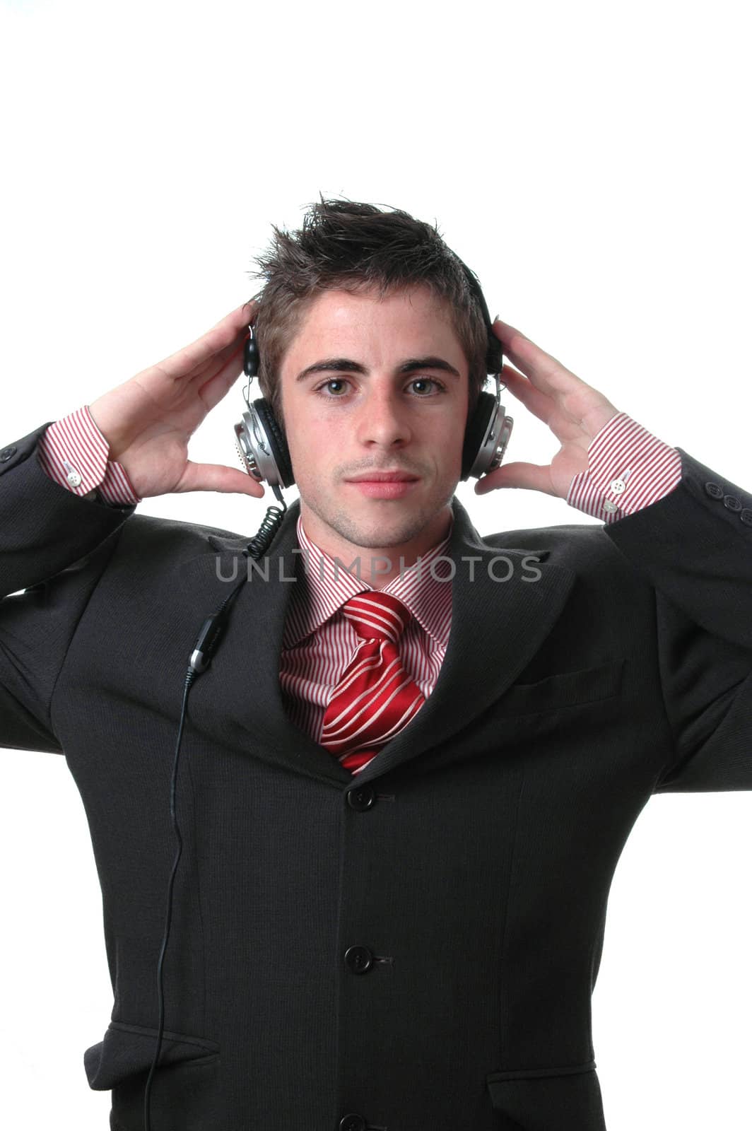 young businessman listen music on white