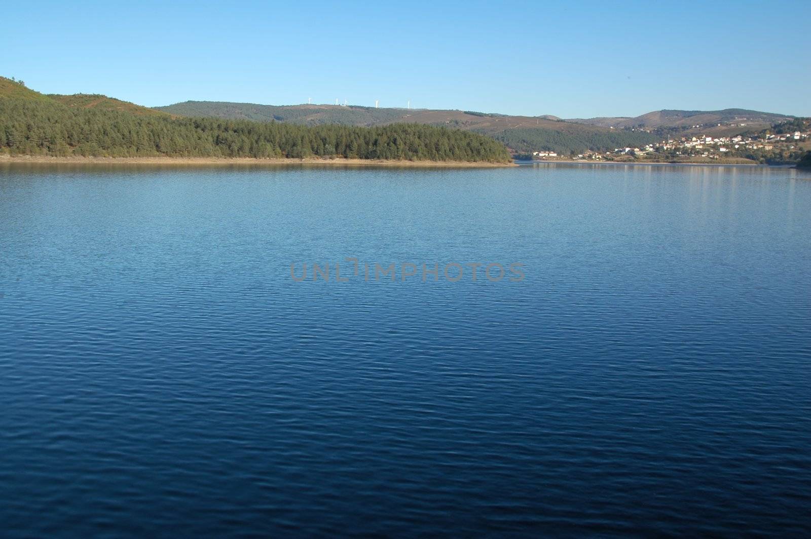 lake of hydroelectric barrage in venda nova, portugal by raalves