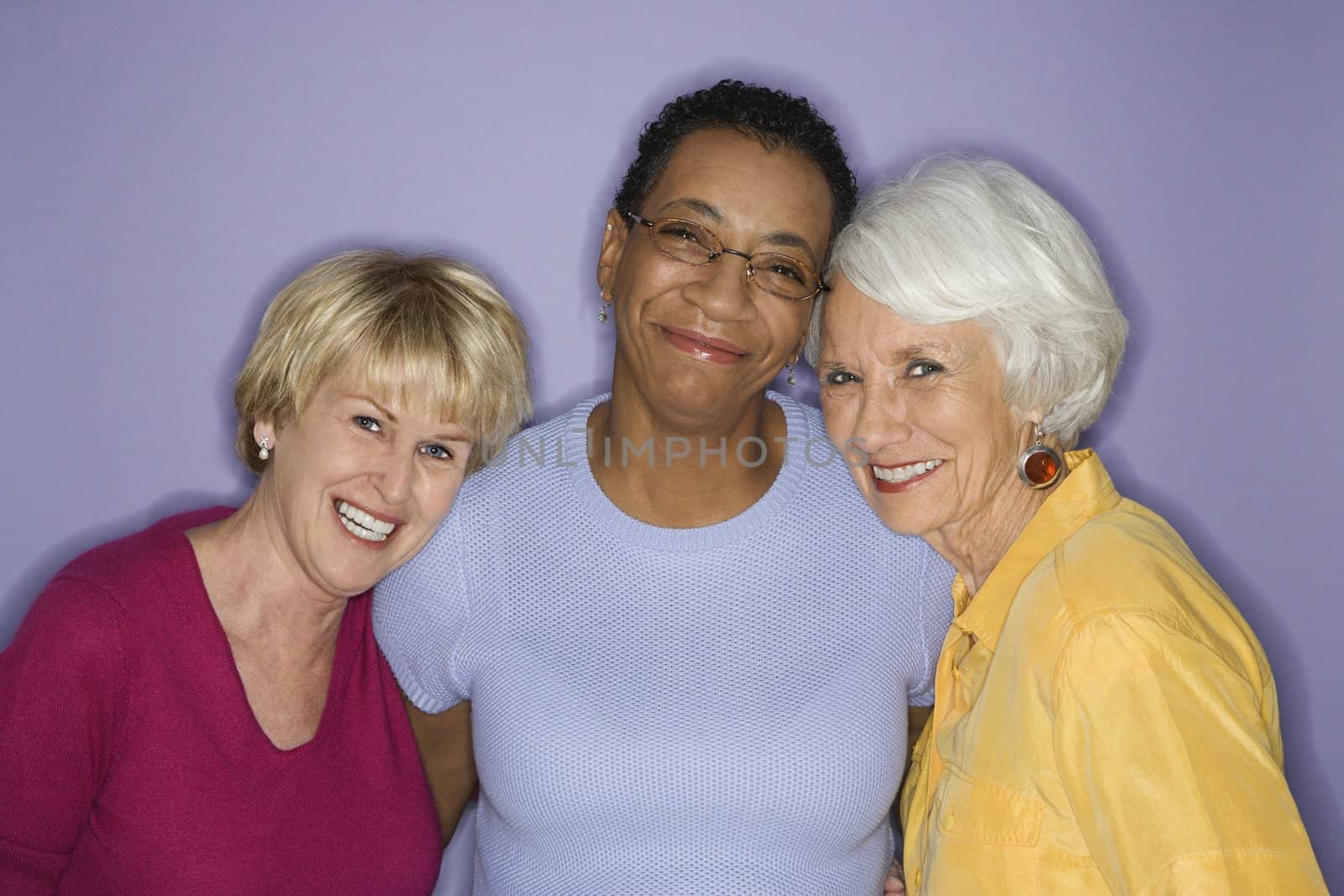 Portrait of Caucasian and African American mature adult females.