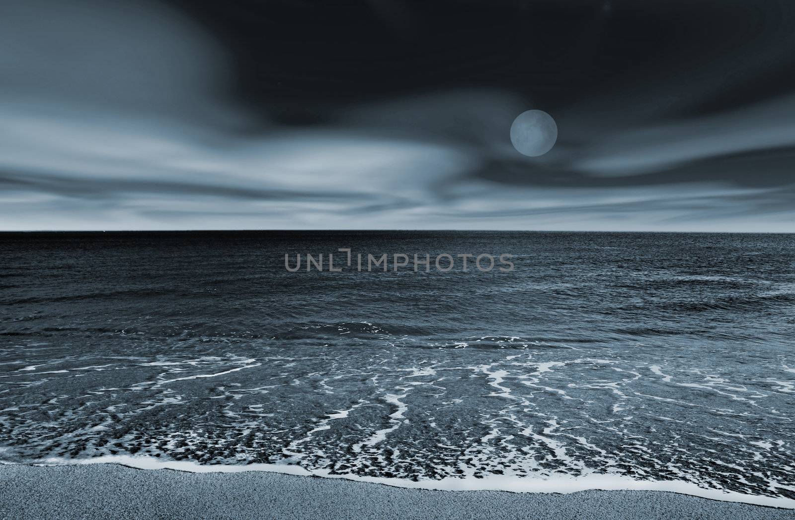 Picture of a beach at night (blue toned)