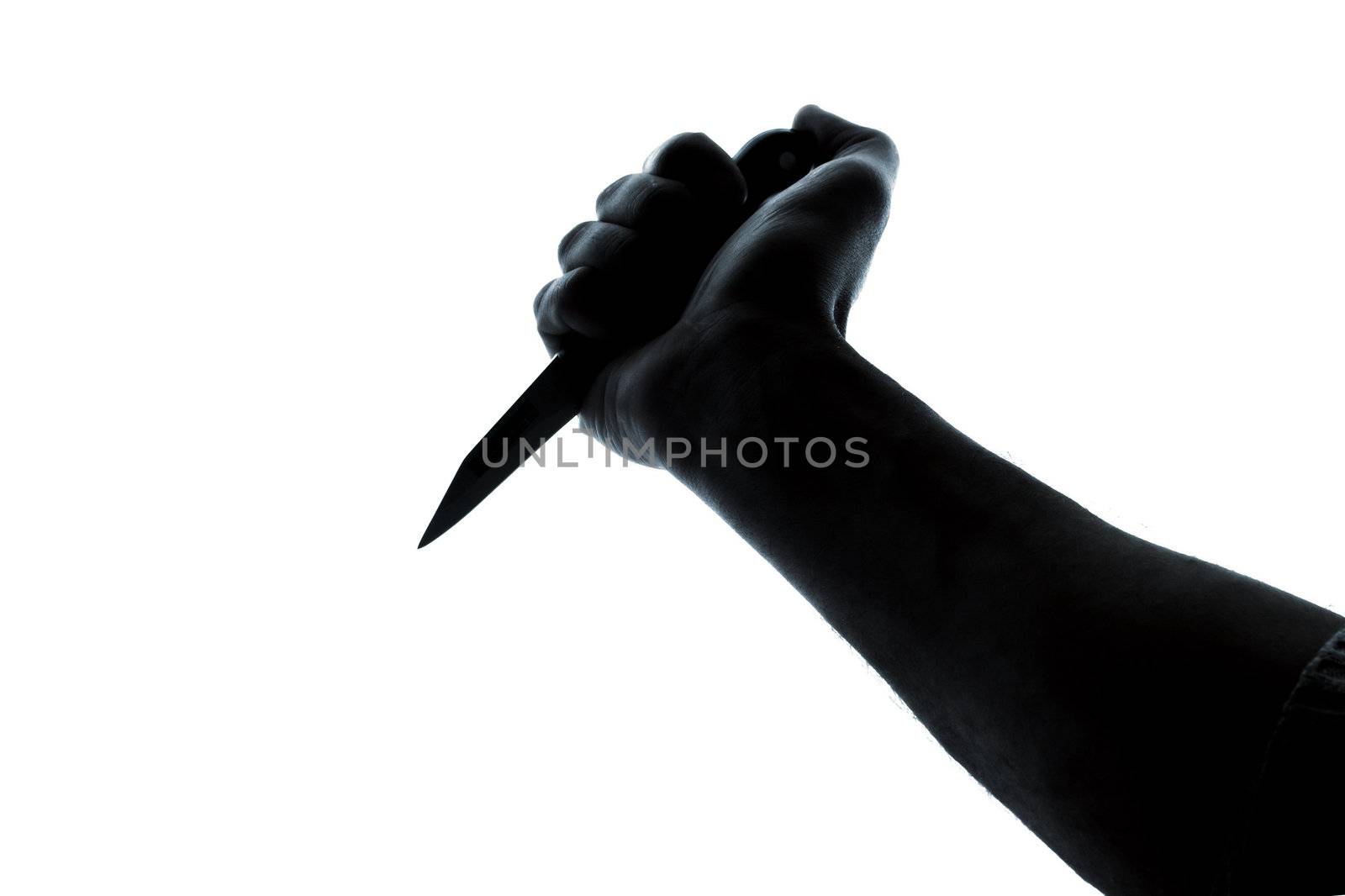 Hand with a knife in a high Key technique