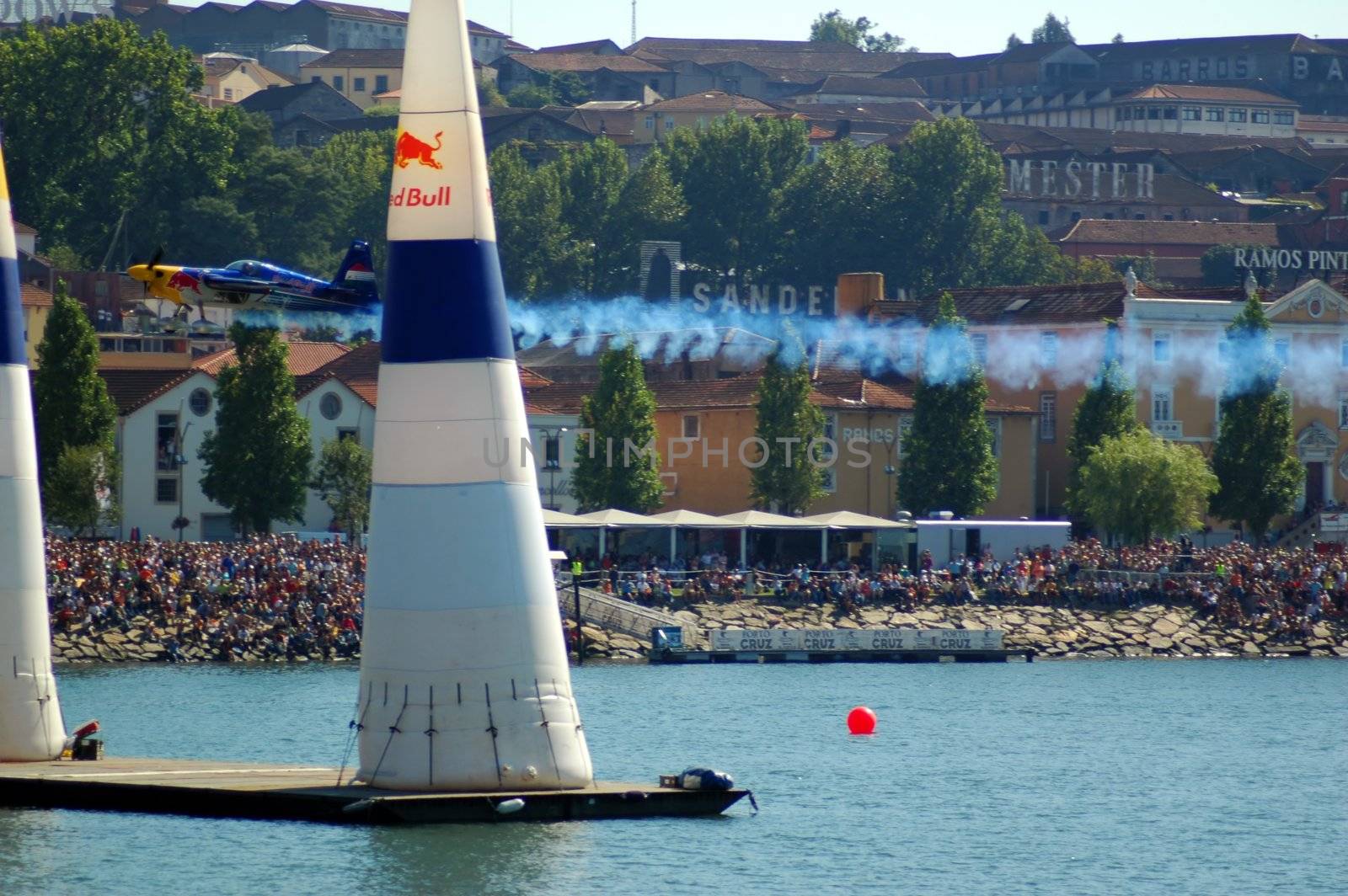 airplane in red bull air race, oporto portugal by raalves