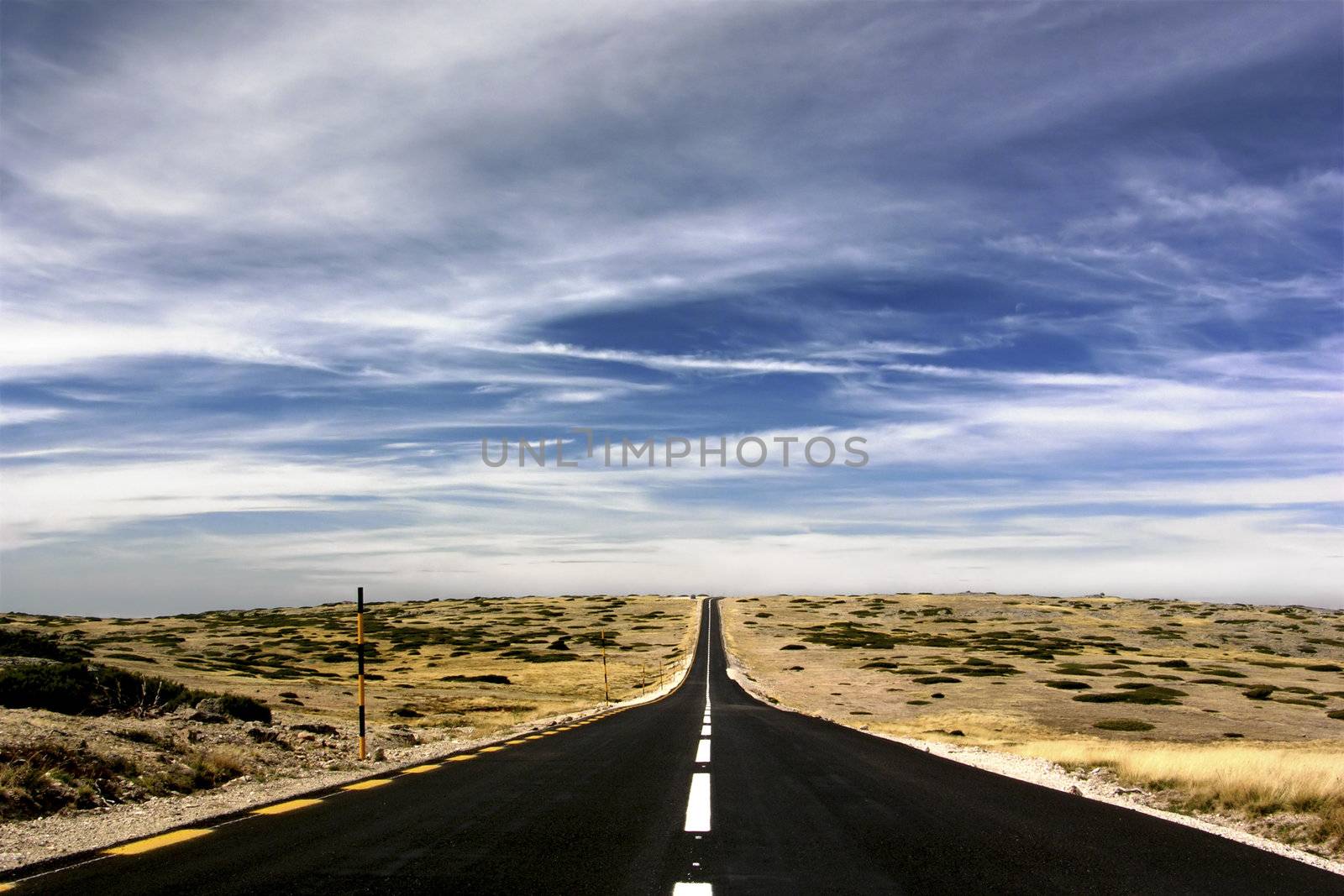 Landscape with a road ending on the horizon