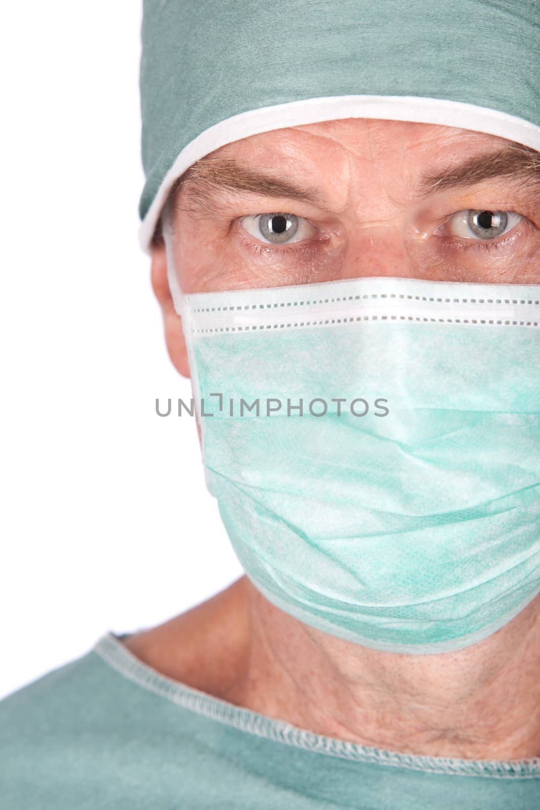 A 60 year old surgeon isolated on a white background.