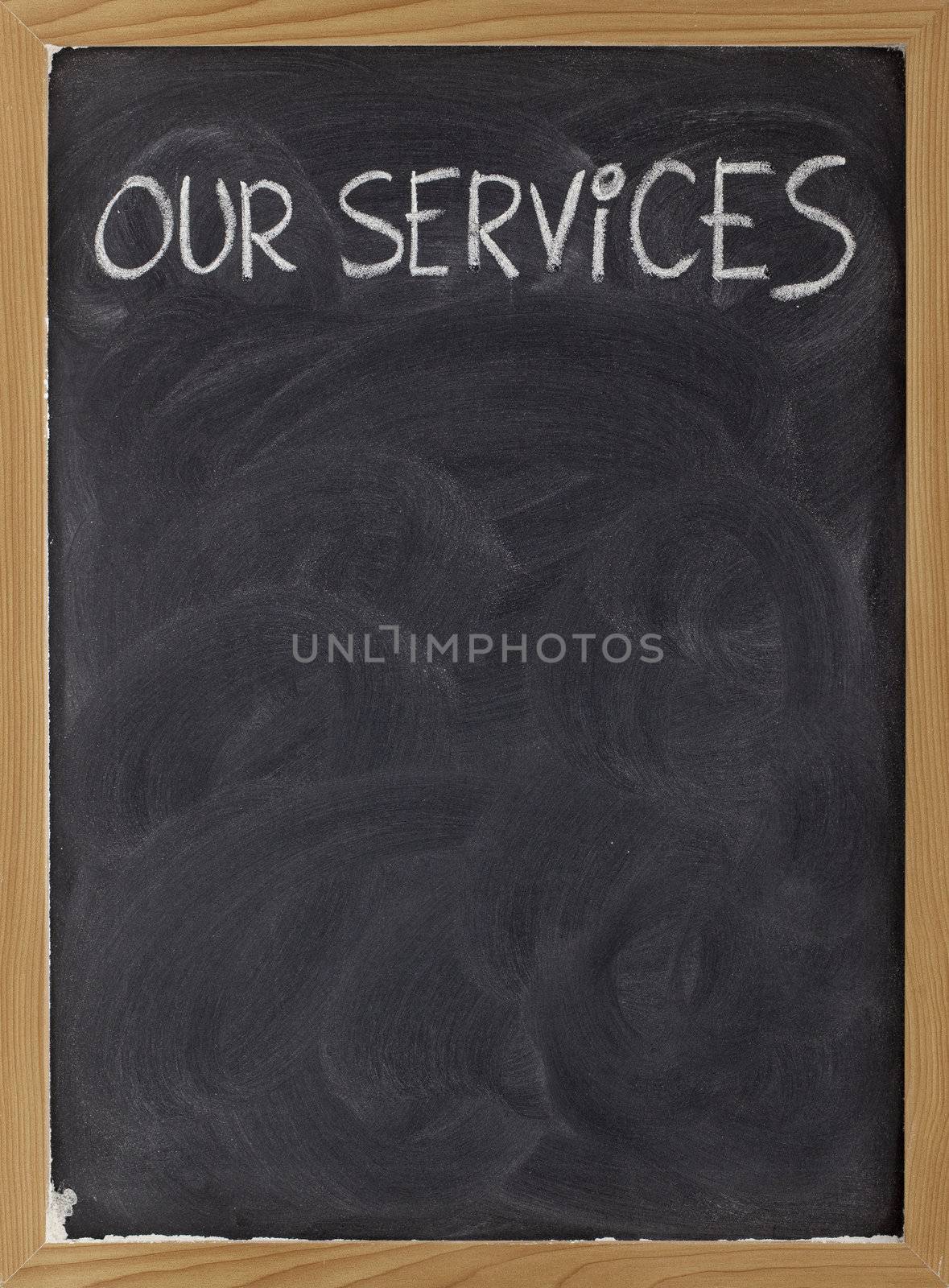 our services blackboard sign by PixelsAway