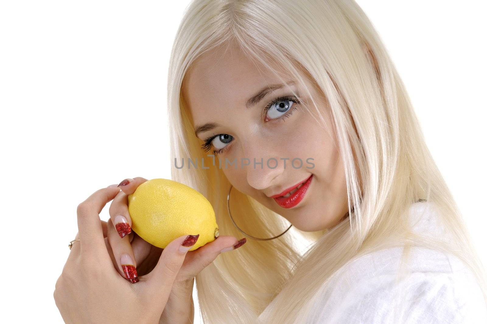 Happy beautiful blond woman with lemon