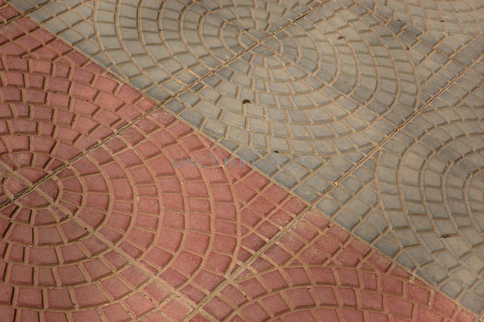 close-up of new old-style pavement of stoneblocks (bricks) of red color